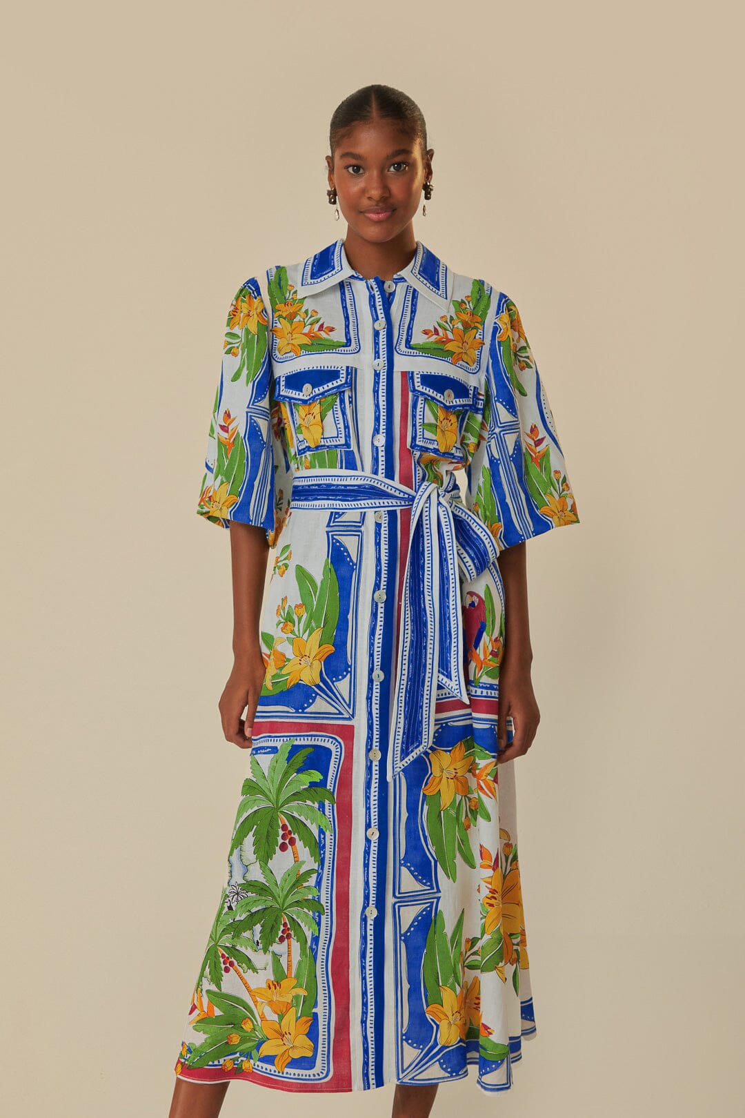 FARM Rio model wearing the Tropical Destination Off-White Midi Dress