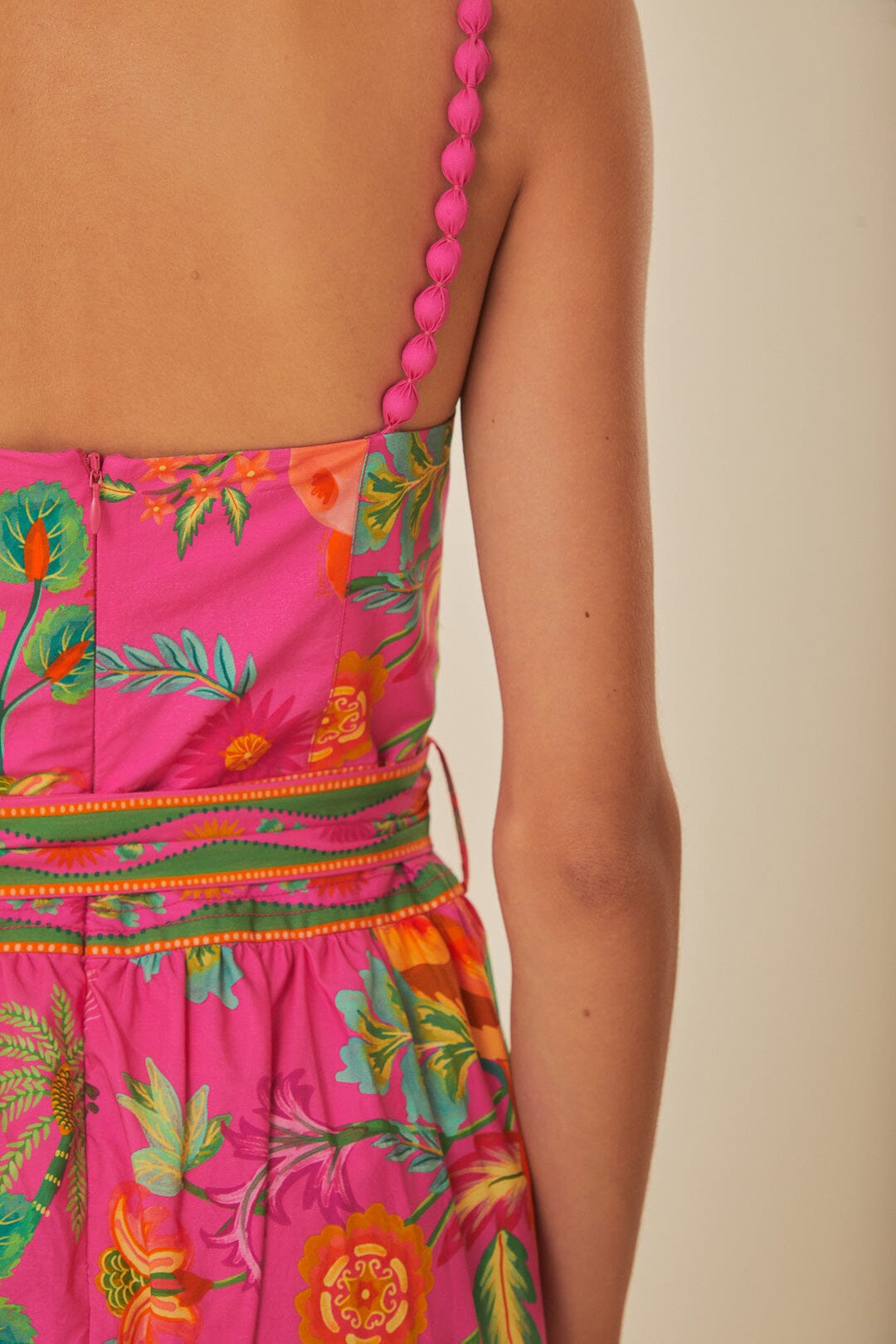FARM Rio model wearing the Delicate Fruit Garden Pink Midi Dress