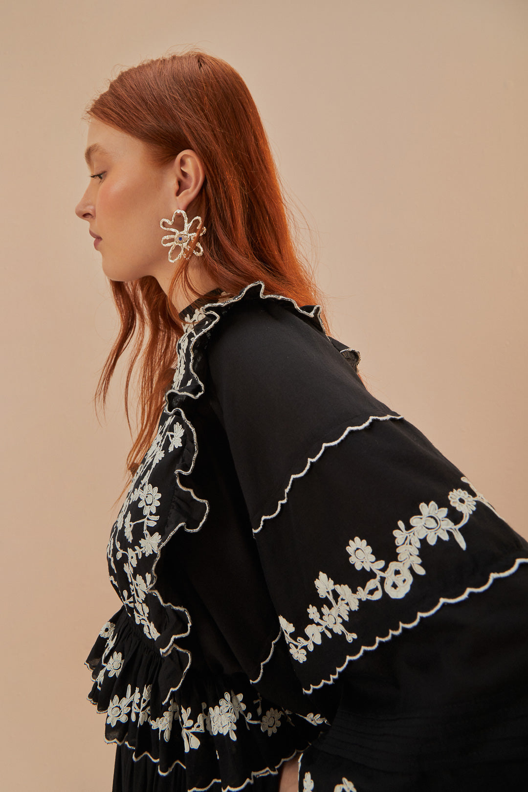 FARM Rio model wearing the Black Embroidered Ruffle Long Sleeve Blouse