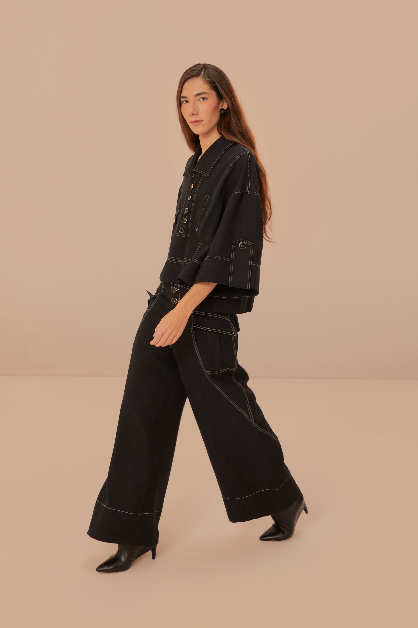 FARM Rio model wearing the Black Low Waisted Topstiched Pants