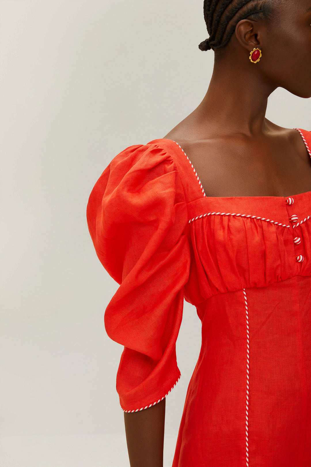 FARM Rio model wearing the Red Straight Neckline Short Sleeve Mini Jumpsuit