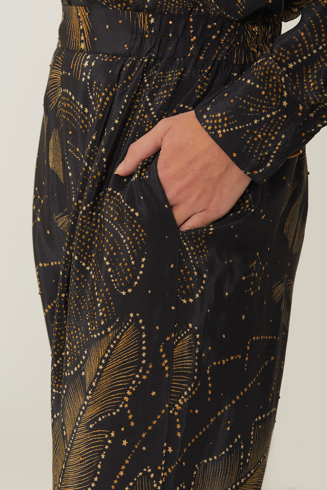 FARM Rio model wearing the Golden Foliage Black Pajama Pants
