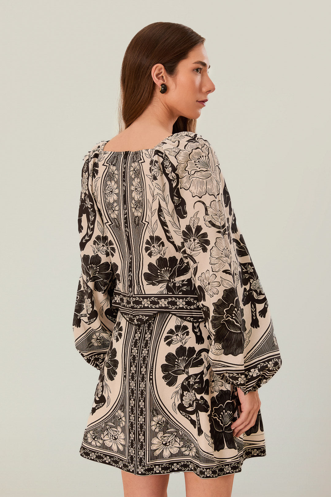 FARM Rio model wearing the Flower Leopards Off-White Long Sleeve Blouse
