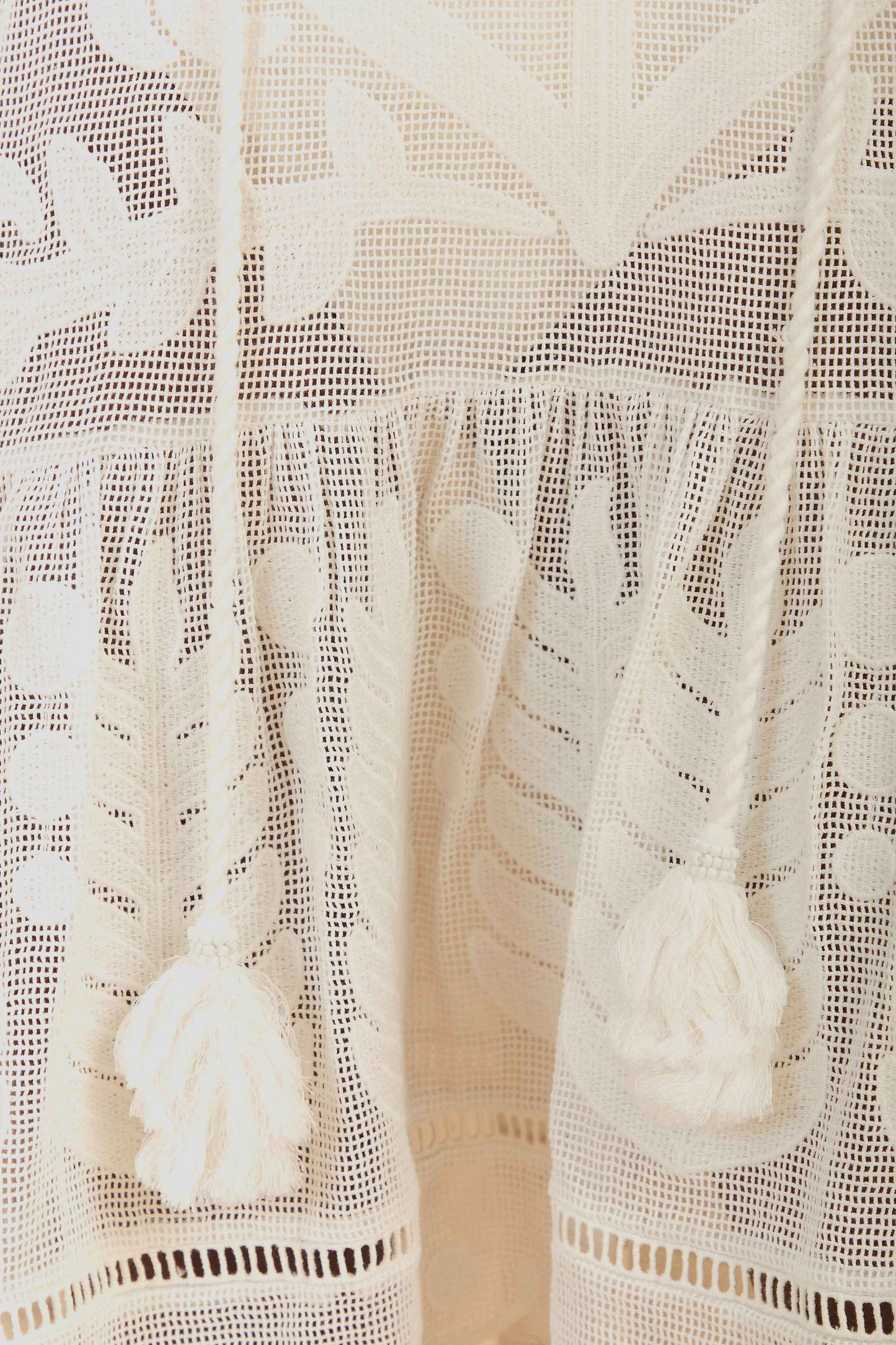 FARM Rio model wearing the White Palm Tree Cutwork Mini Dress