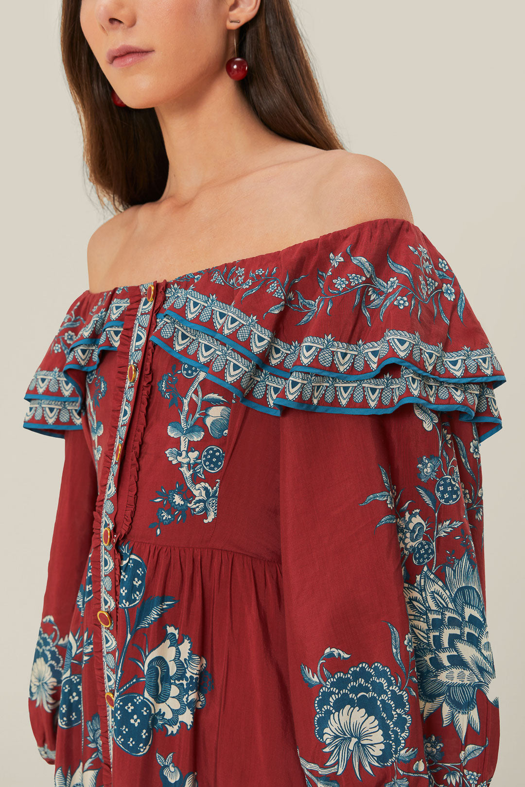 FARM Rio model wearing the Red Tropical Landing Off Shoulder Maxi Dress