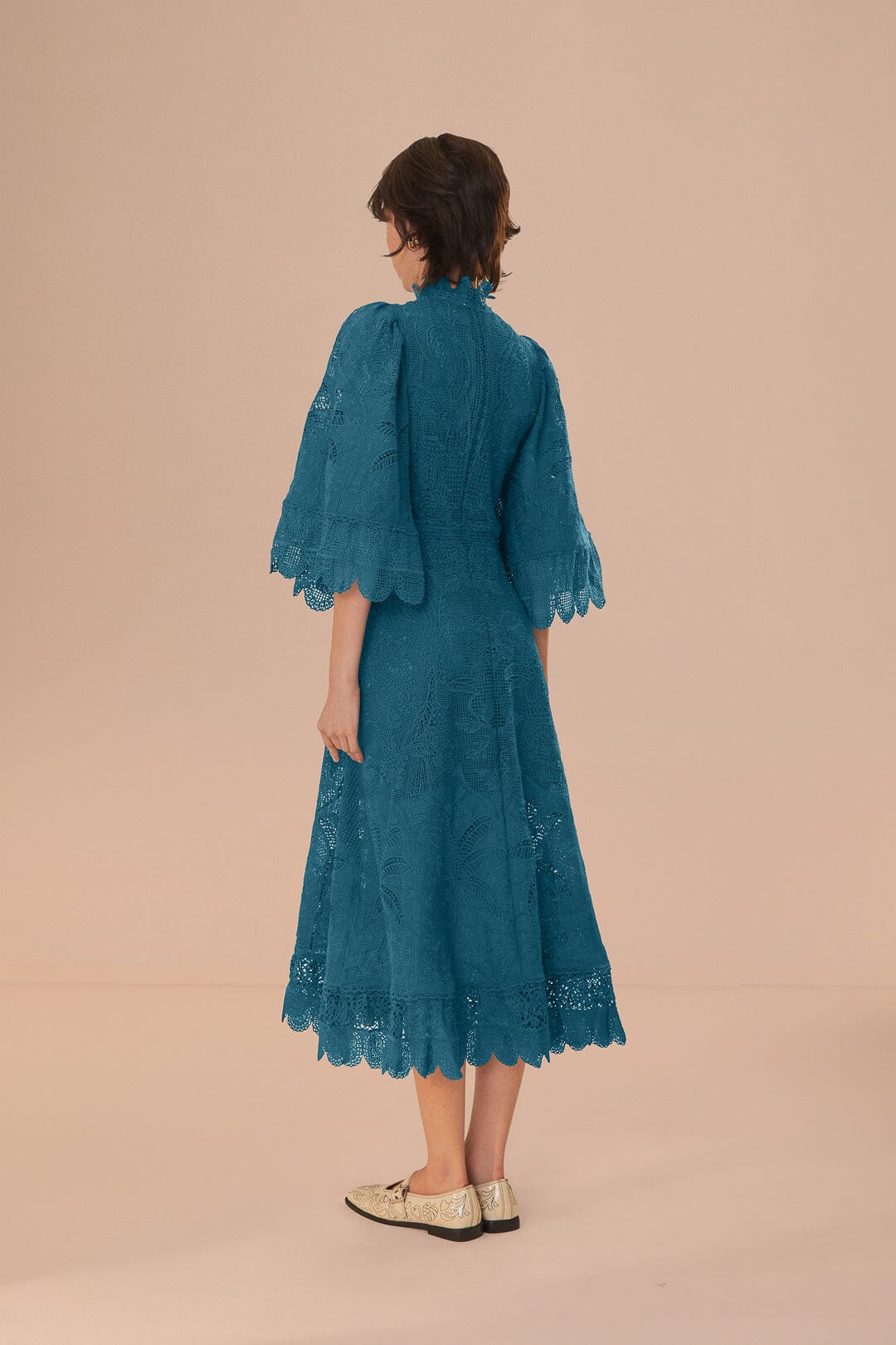 FARM Rio model wearing the Green Guipire Cut-Out Midi Dress