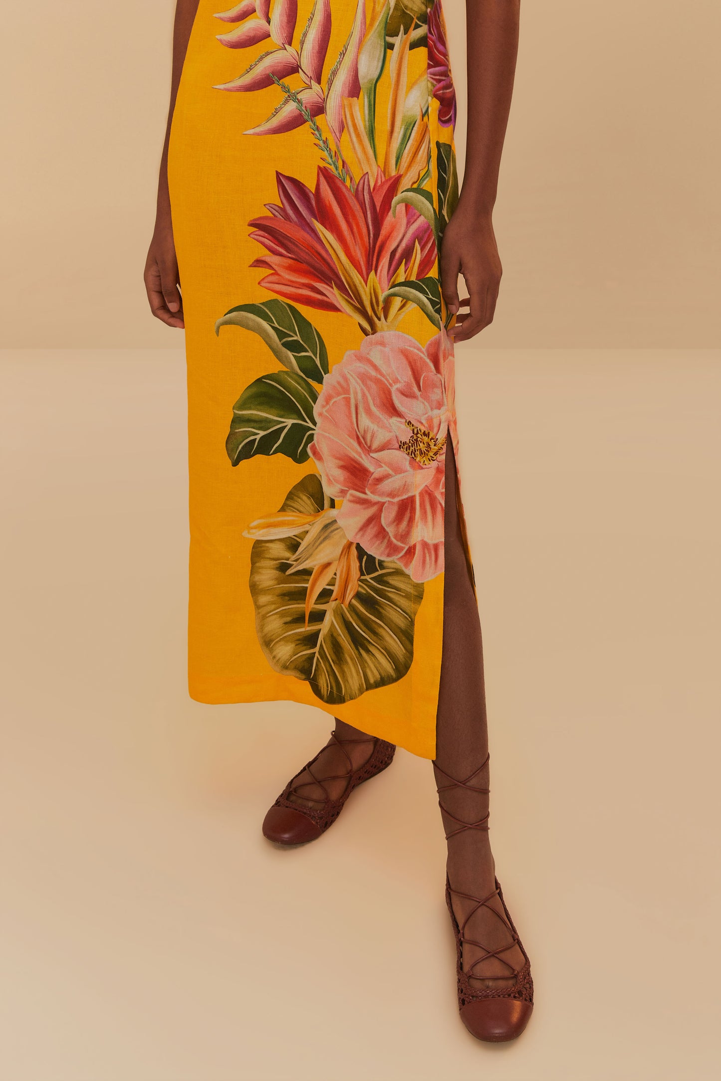 FARM Rio model wearing the Spring Awakening Off-White Midi Dress Sleeveless