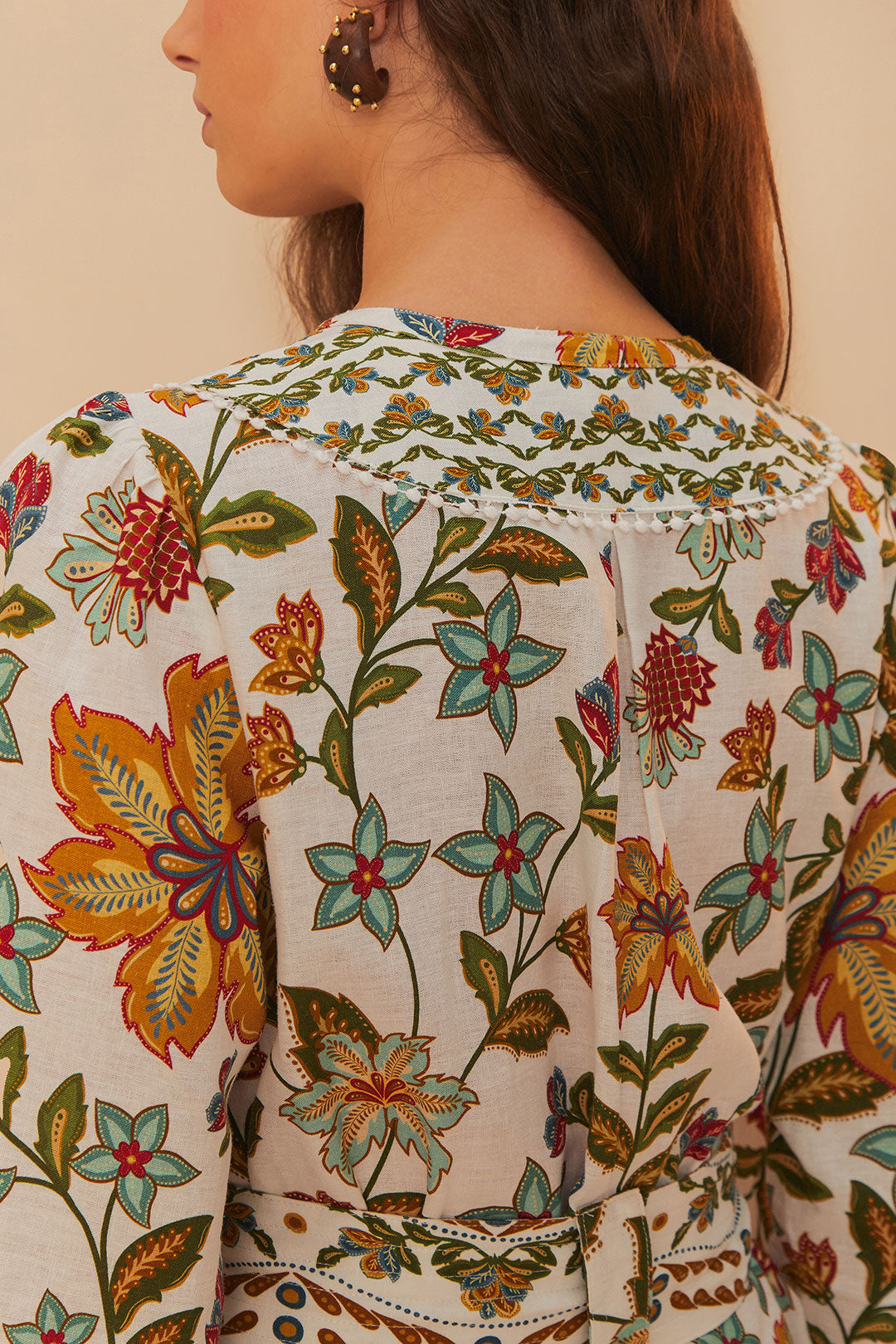 FARM Rio model wearing the Botanicals Off-White Romper