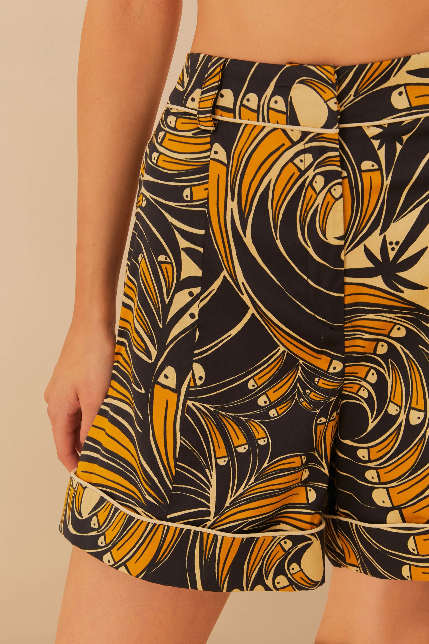 FARM Rio model wearing the BlackToucan Spirals Shorts