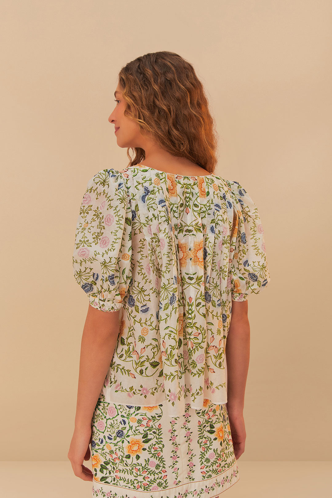 FARM Rio model wearing the Folk Floral Off-White Scoop Neck Short Sleeve Blouse