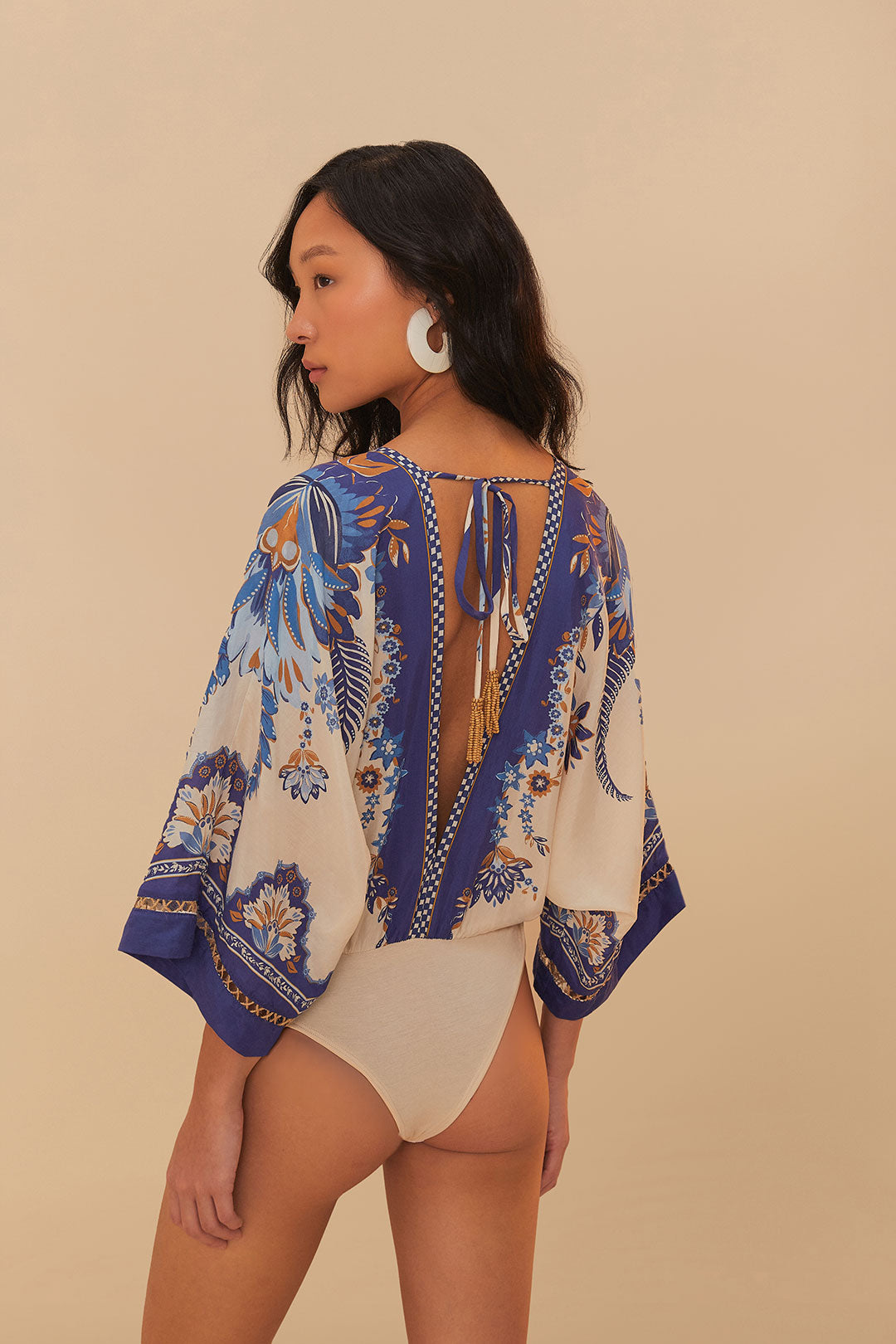 FARM Rio model wearing the Ana Tapestry Off-White Bodysuit