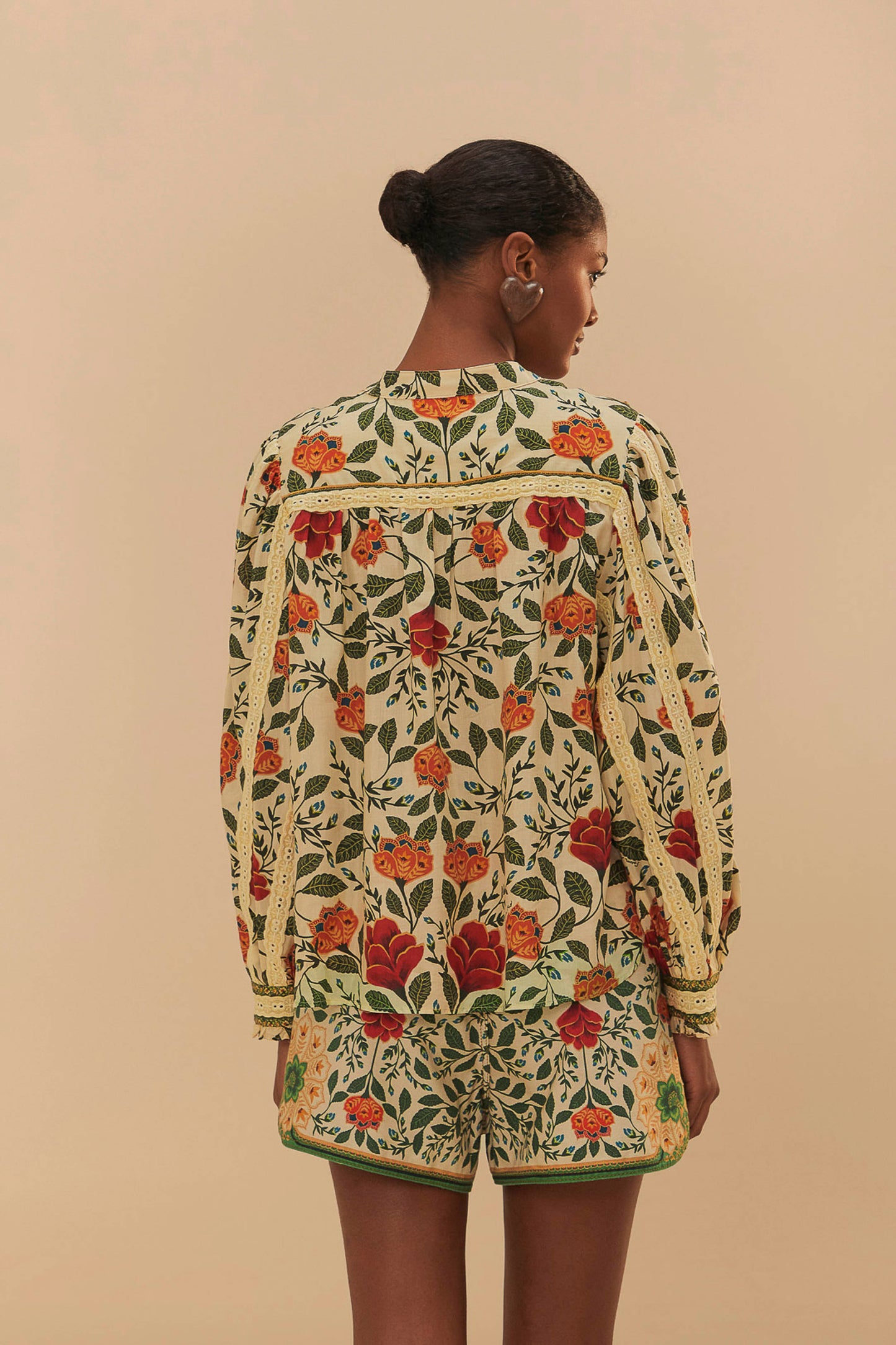 FARM Rio model wearing the Sand Garden Tapestry Blouse