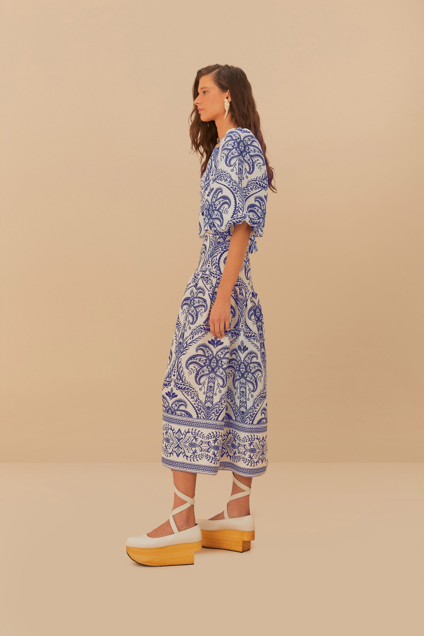 FARM Rio model wearing the Off-White Tropical Cameo Euroflax™ Premium Linen Midi Skirt