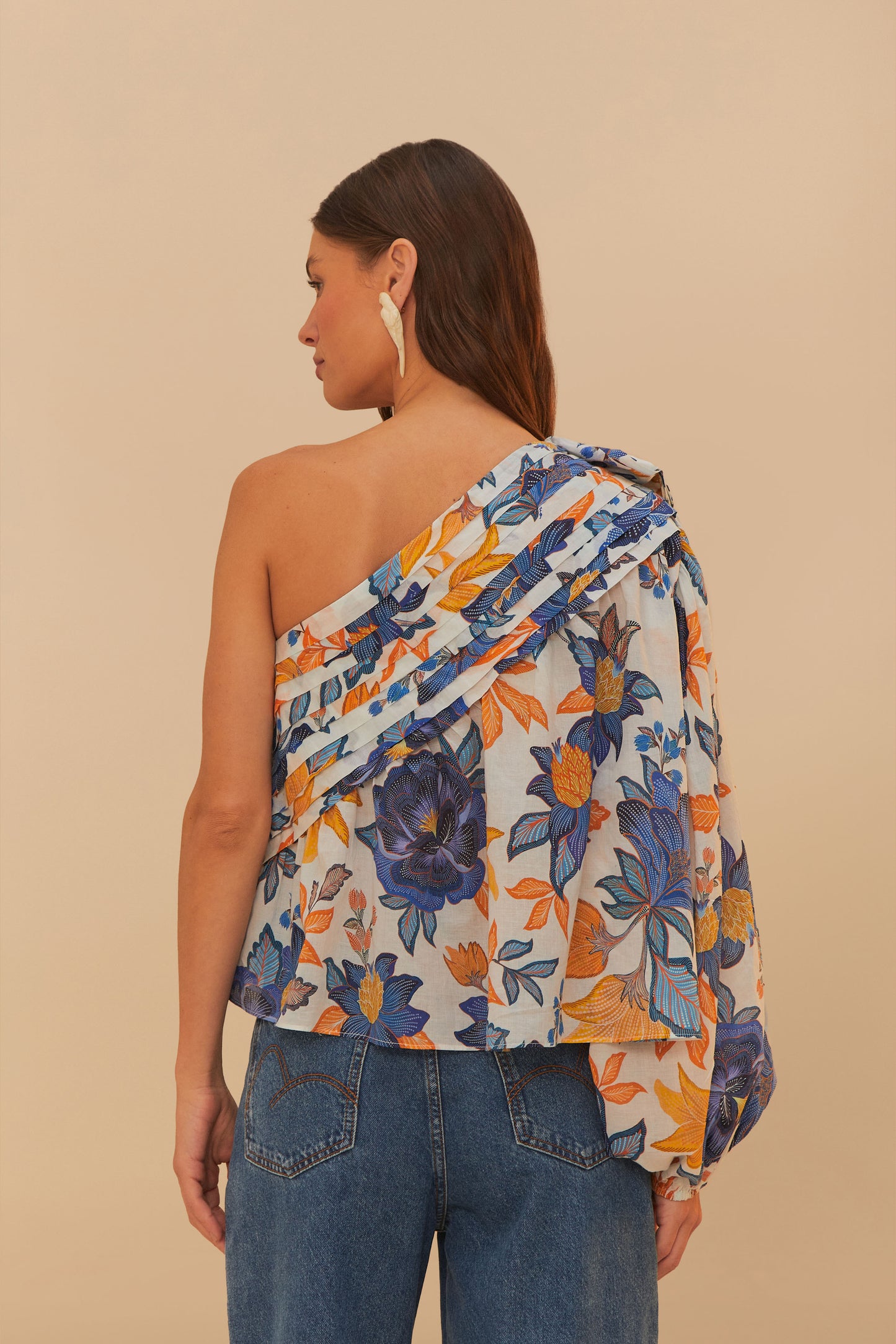 FARM Rio model wearing the Off-White Summer Flowers 3D Rose One-Shoulder Blouse