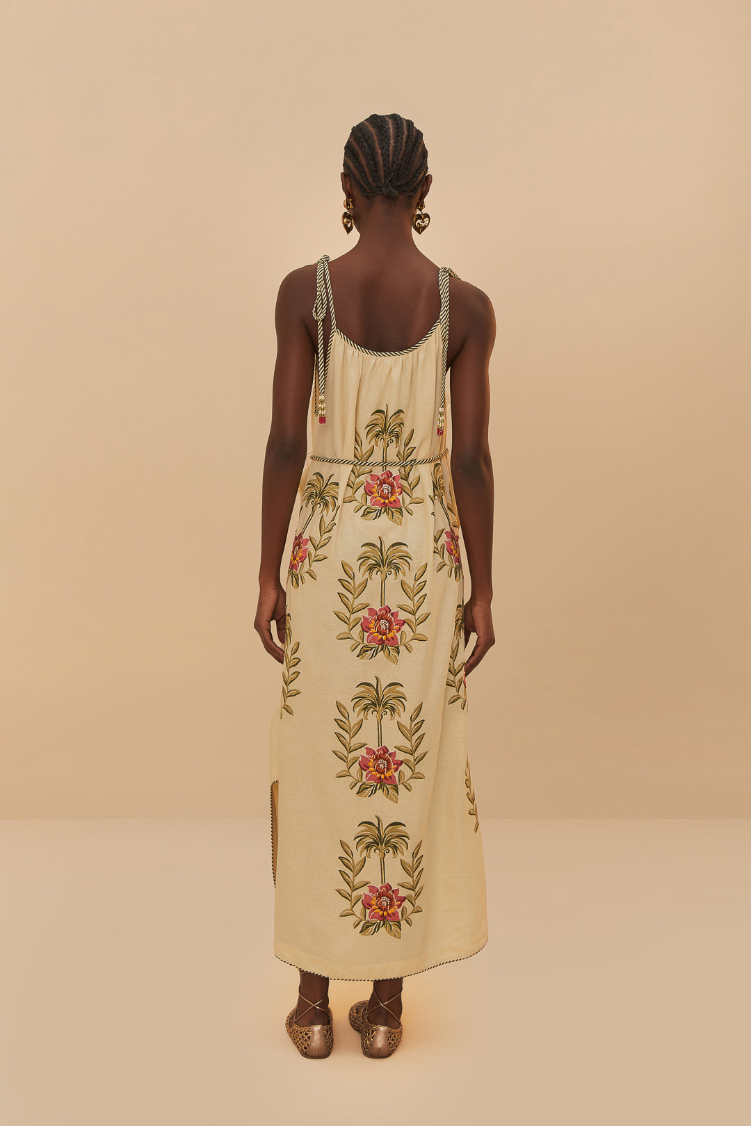 FARM Rio model wearing the Tropical Flower Embroidered Sand Maxi Dress