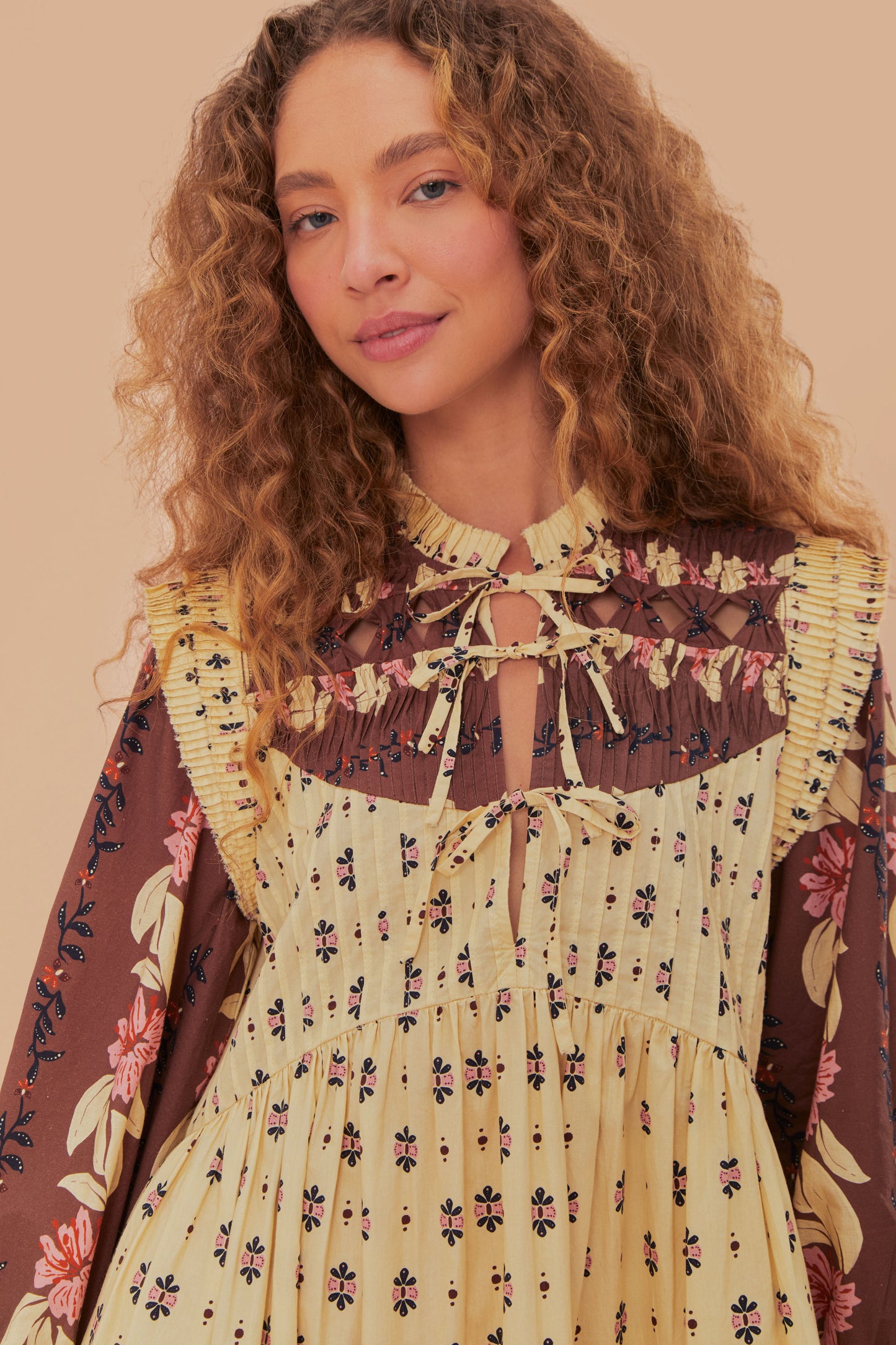 FARM Rio model wearing the Ainika Maxi Floral Cream Open Yoke Mini Dress