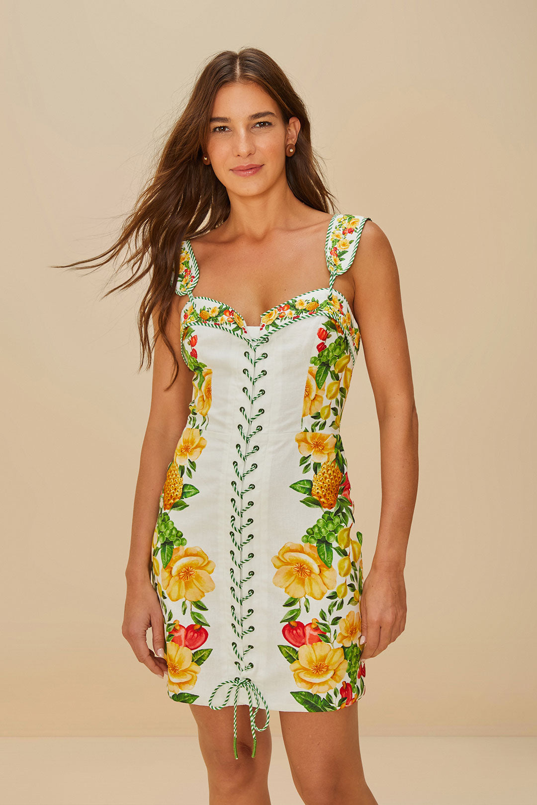 FARM Rio model wearing the Off-White Picnic Flowers LENZING™ ECOVERO™ Euroflax™ Mini Dress