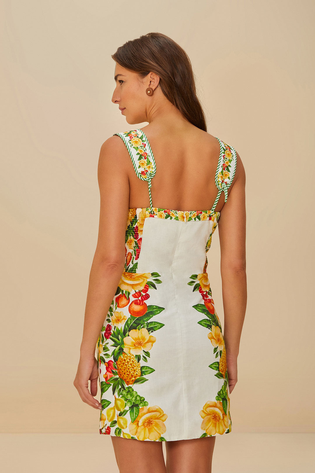 FARM Rio model wearing the Off-White Picnic Flowers LENZING™ ECOVERO™ Euroflax™ Mini Dress