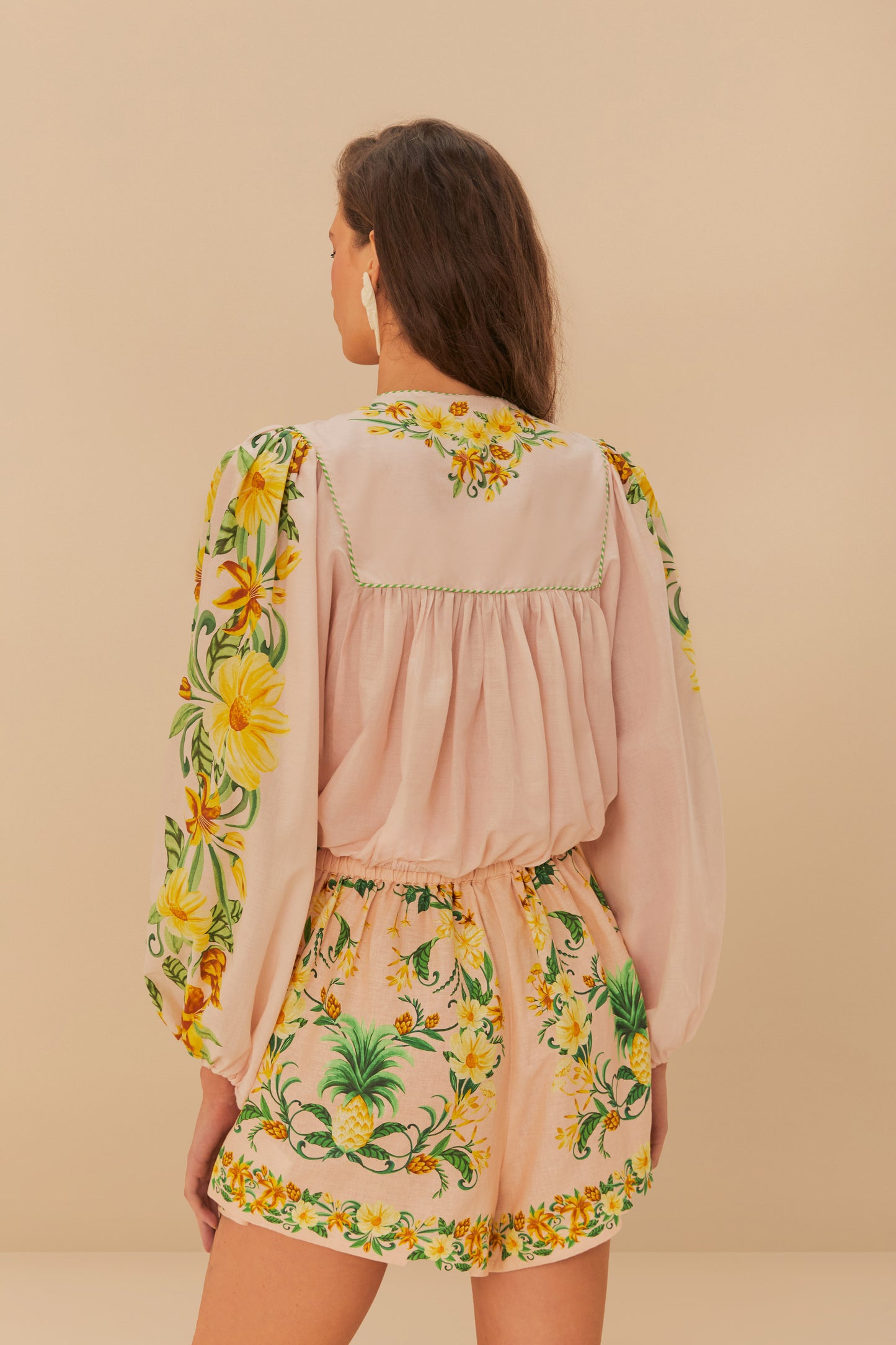 FARM Rio model wearing the Botanical Beauty Pink Shorts