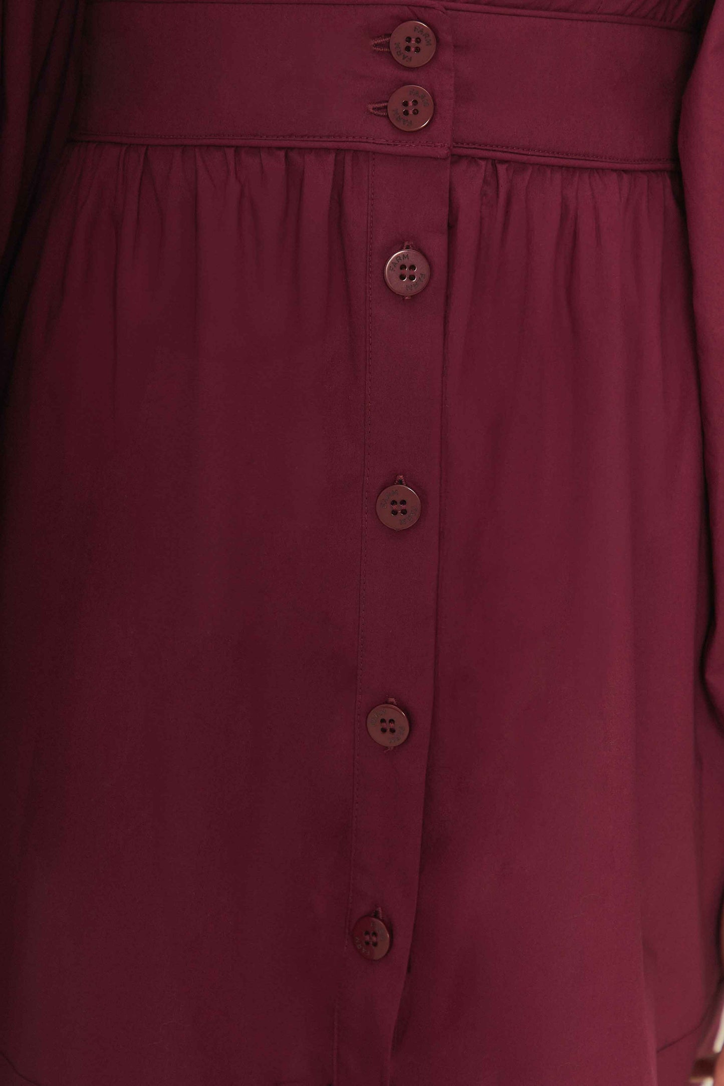 FARM Rio model wearing the Burgundy Puffed Sleeve Mini Dress