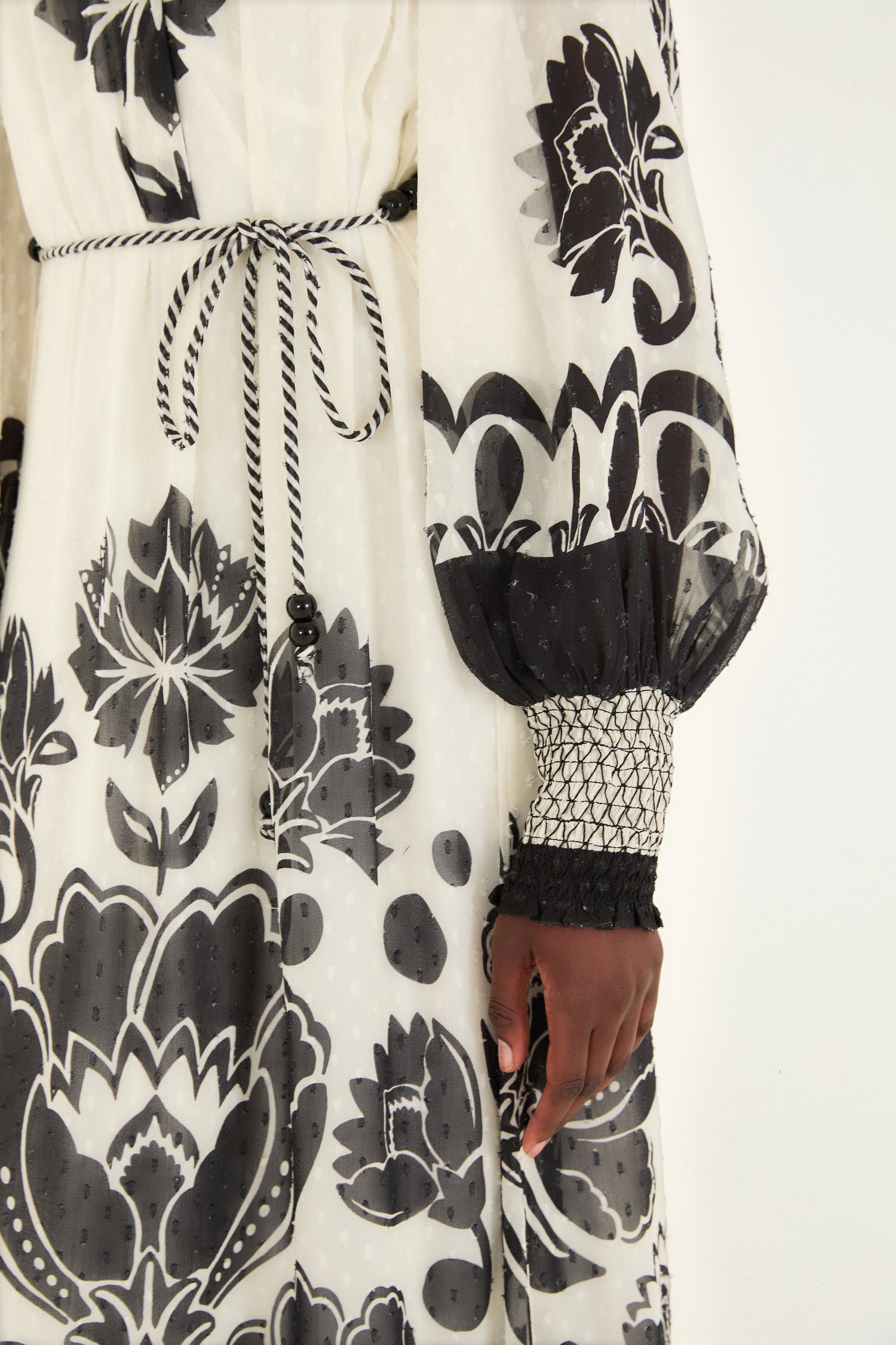 FARM Rio model wearing the cream floral arabesque rope belt maxi dress