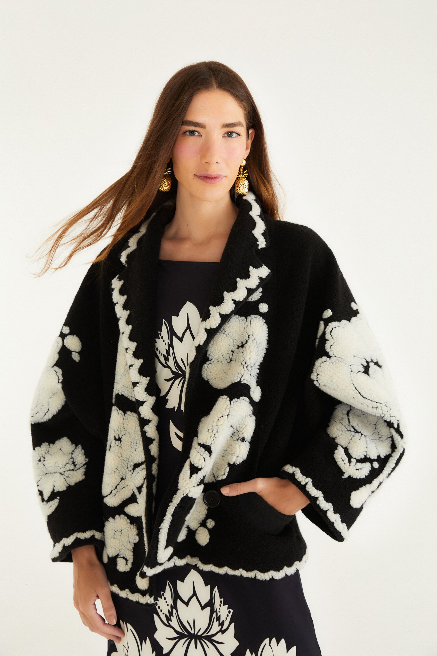 FARM Rio model wearing the Black & White Floral Arabesque Fleece Coat