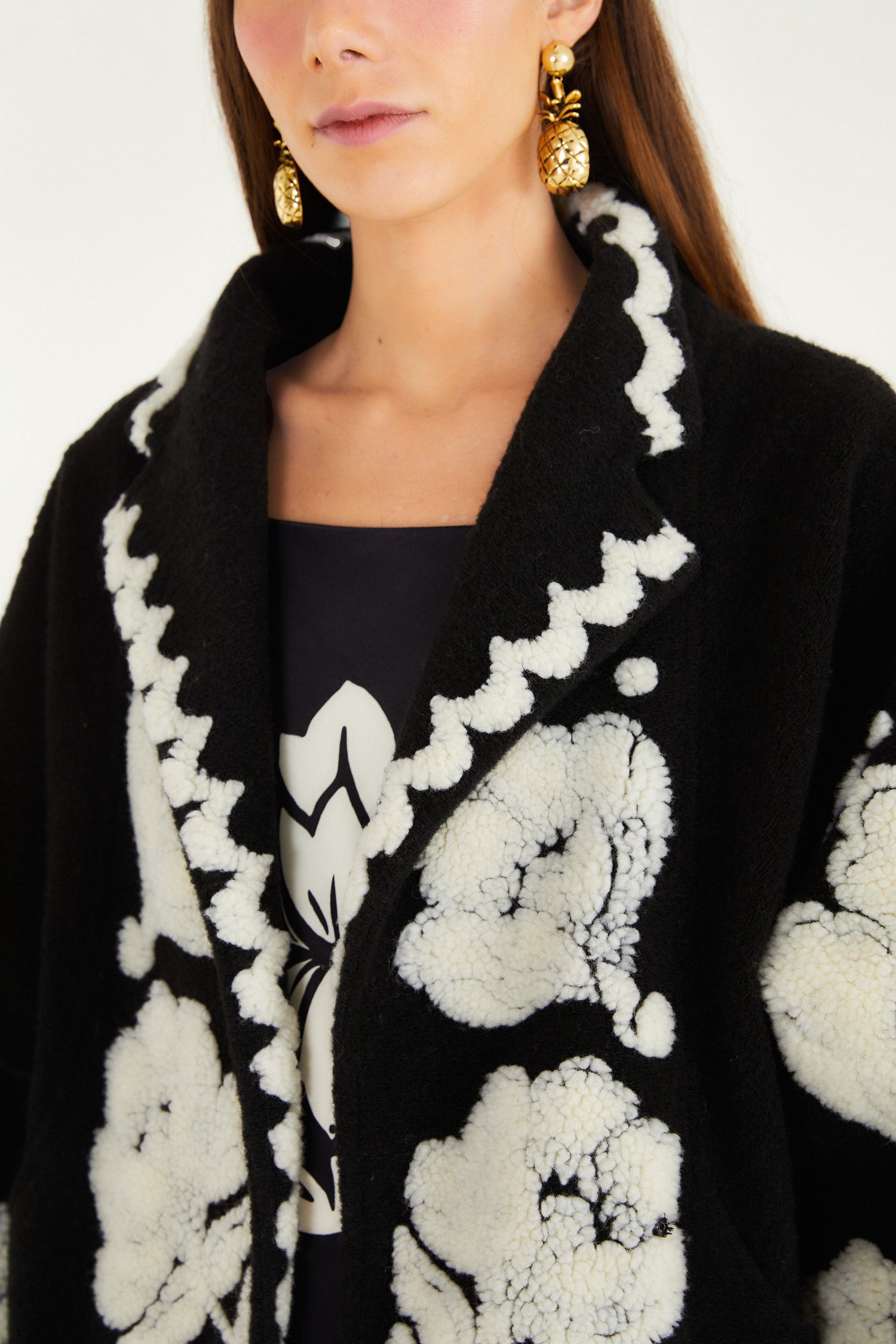 FARM Rio model wearing the Black & White Floral Arabesque Fleece Coat