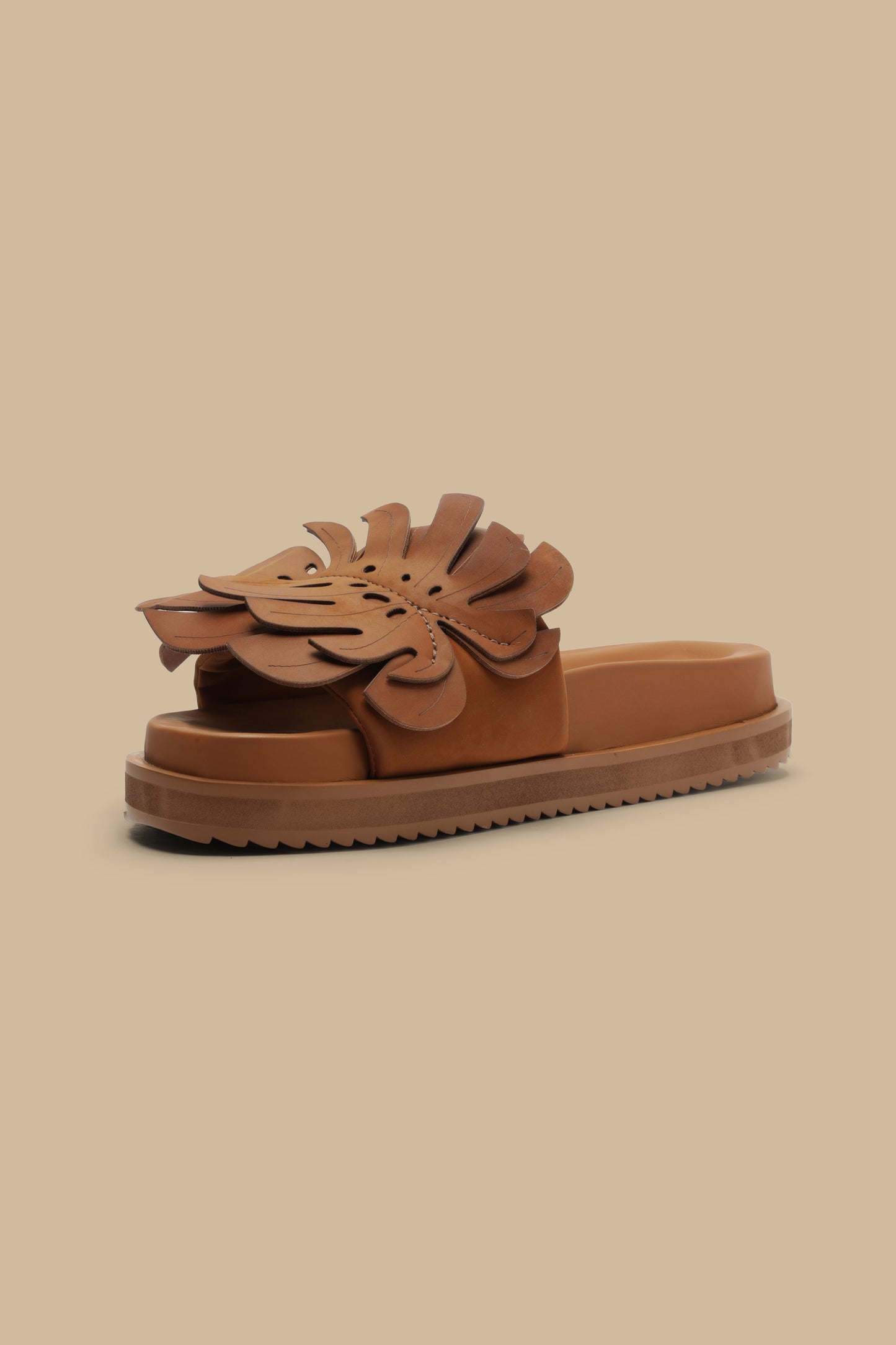 FARM Rio model wearing the Camel Monstera Slide Sandal
