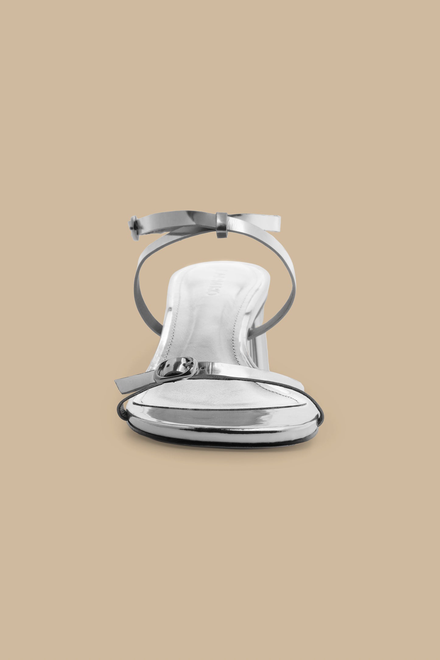 FARM Rio model wearing the Silver Monstera Heeled Scallop Sandal