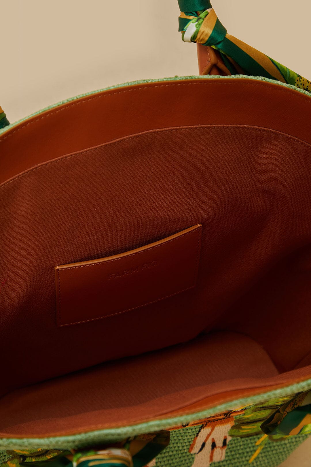 FARM Rio model wearing the Green Coconut Toucan Raffia Shell Tote