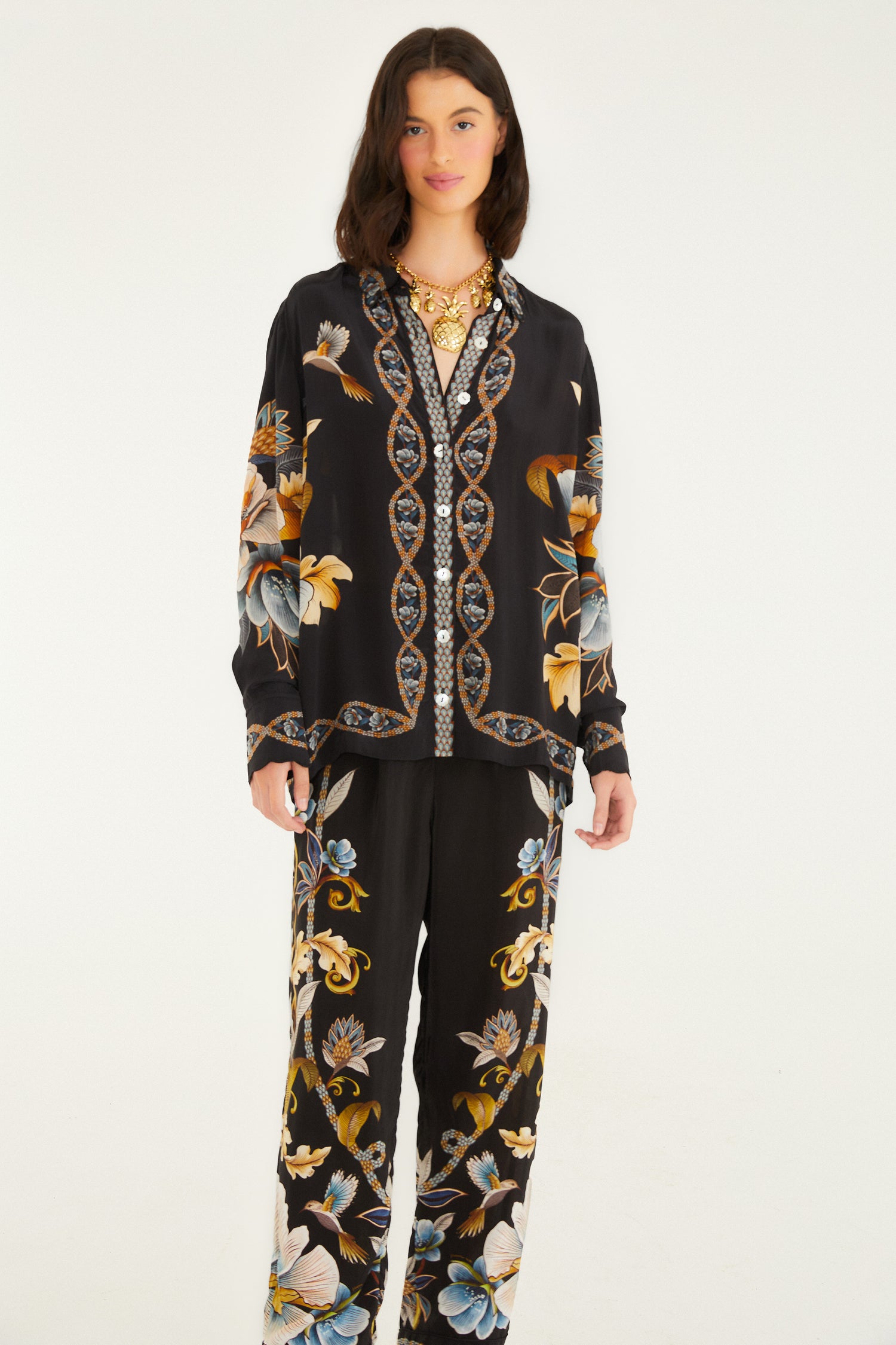 FARM Rio model wearing the Black Flowerful Garden Pajama Pants