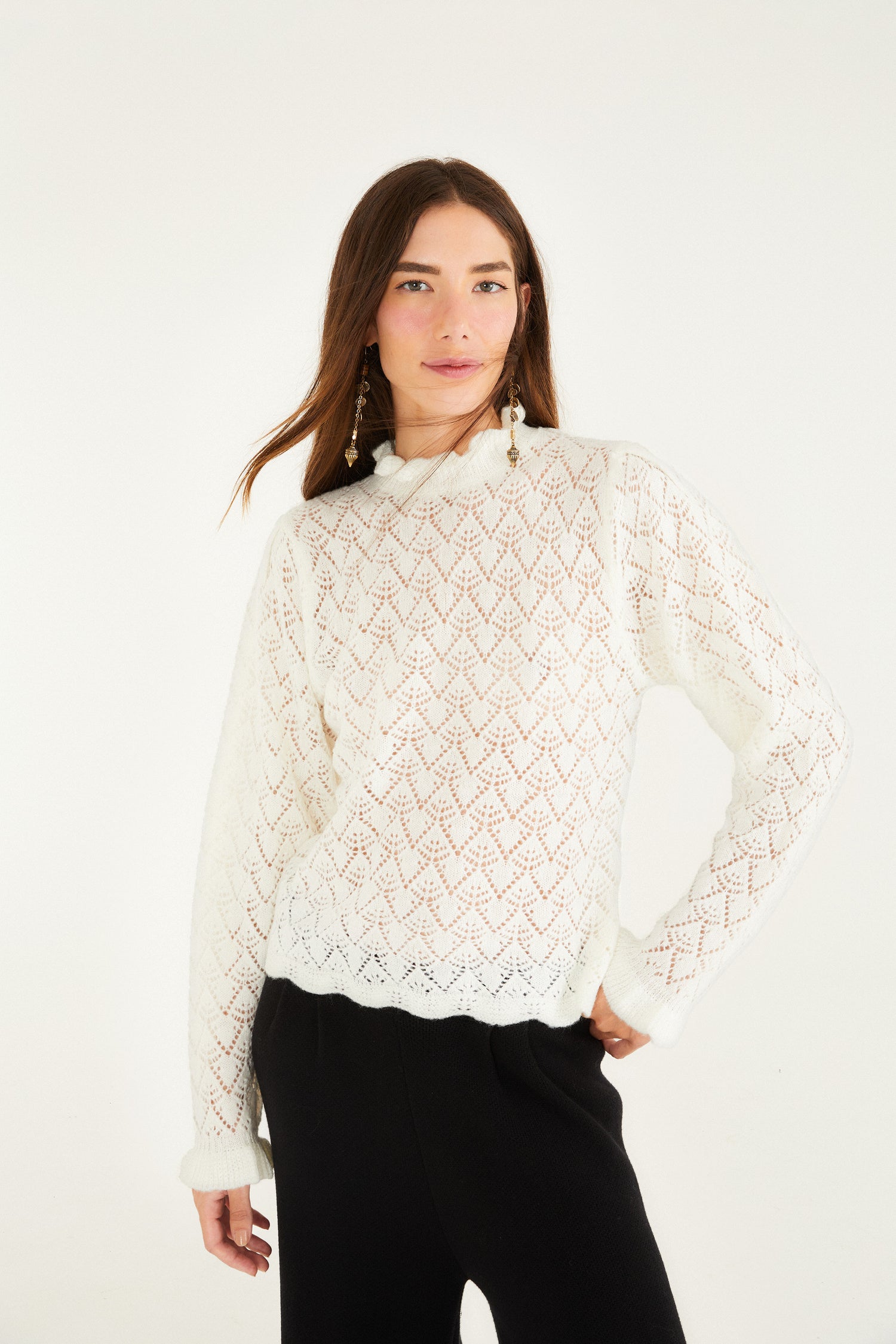 FARM Rio model wearing the Lace Stitch Ruffles Off-White Knit Blouse