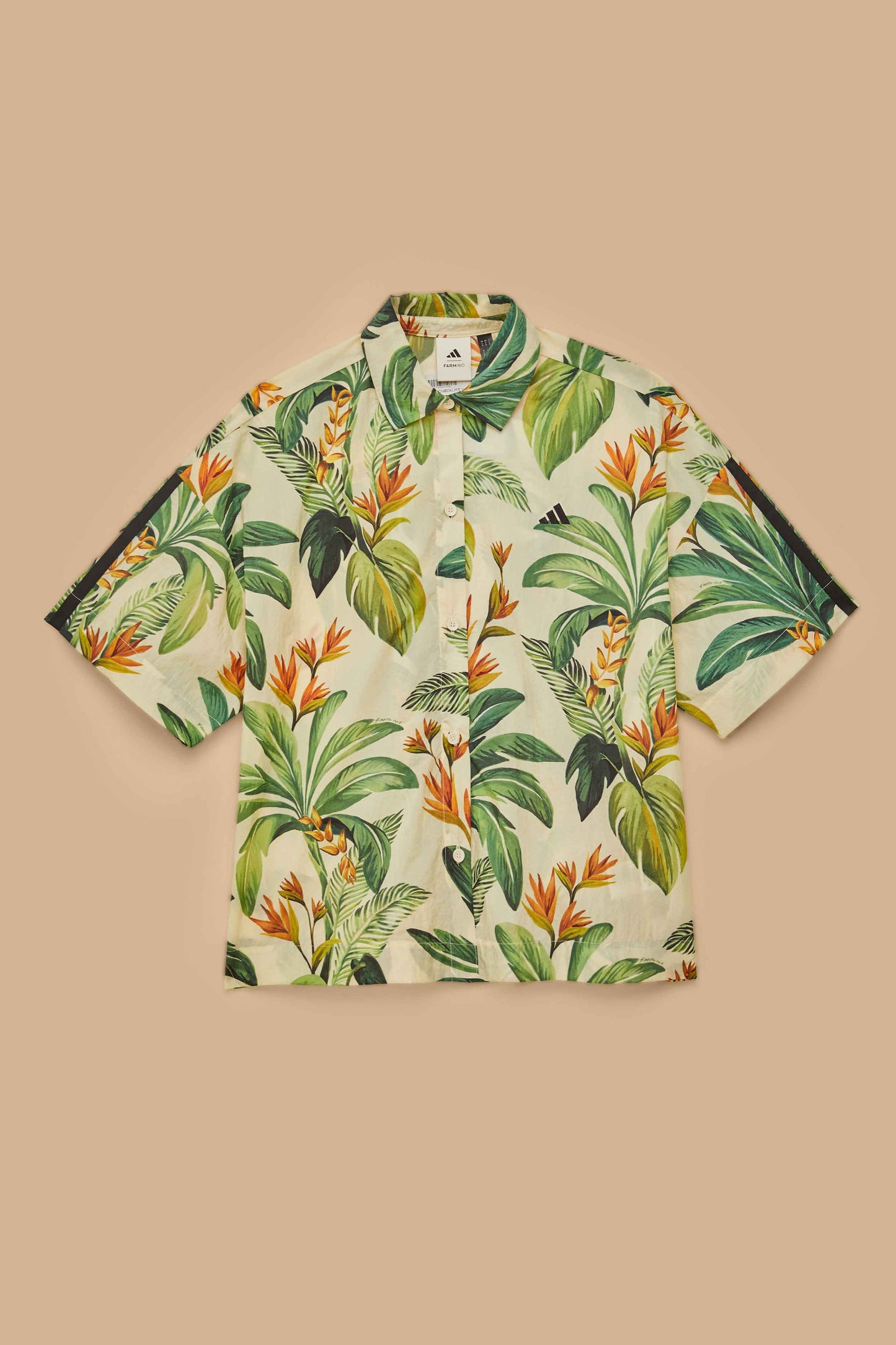 FARM Rio model wearing the Adidas Tropical Breeze Cream White Shirt