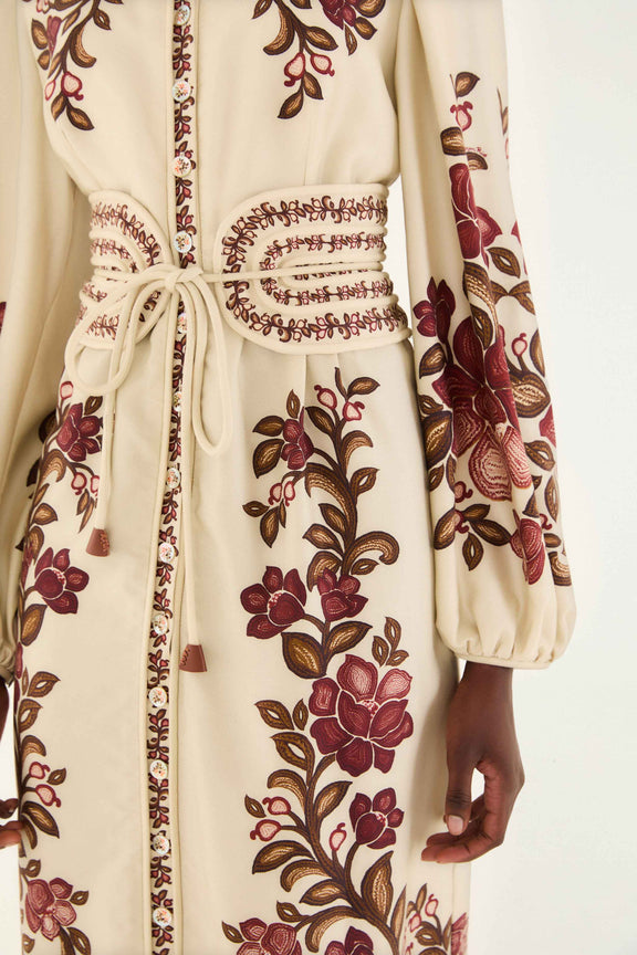 FARM Rio model wearing the Sand Renata Floral Long Sleeve Midi Dress