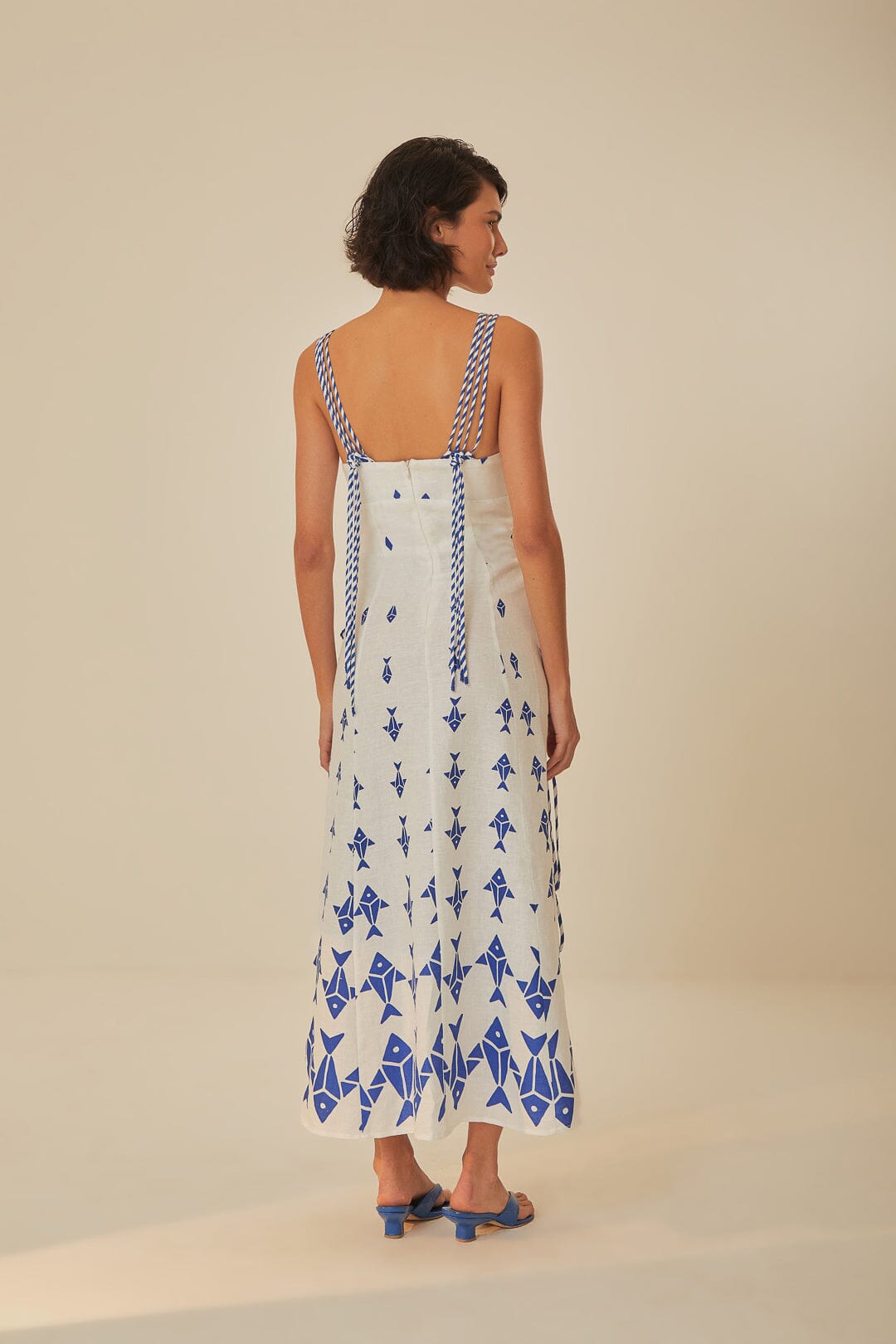 FARM Rio model wearing the Graphic Fishes Off-White Maxi Dress
