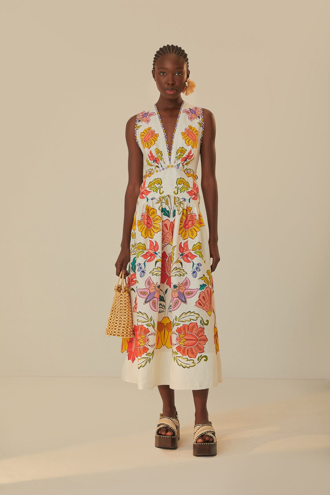 FARM Rio model wearing the Floral Insects Off-White V Neckline Sleeveless Maxi Dress