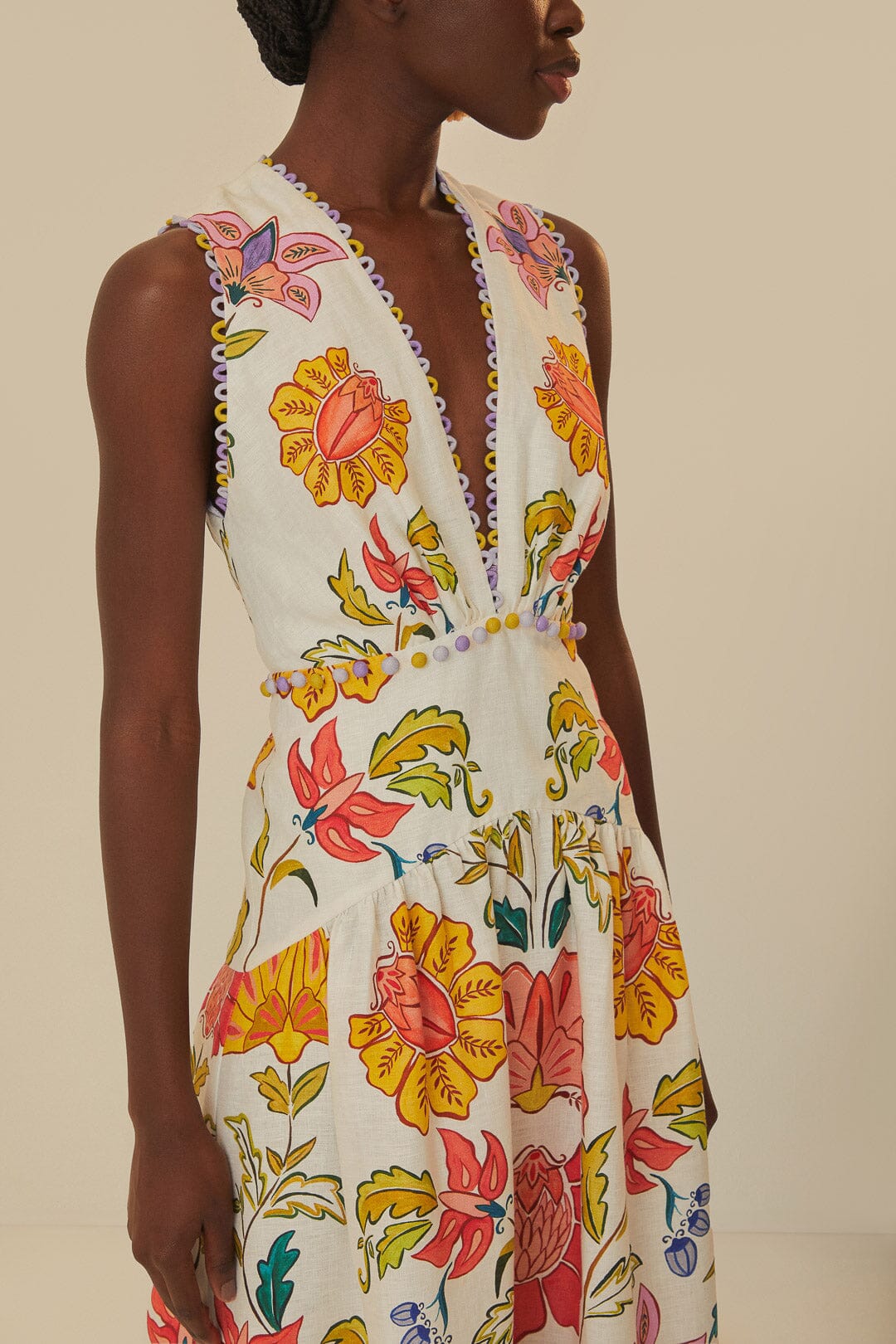 FARM Rio model wearing the Floral Insects Off-White V Neckline Sleeveless Maxi Dress