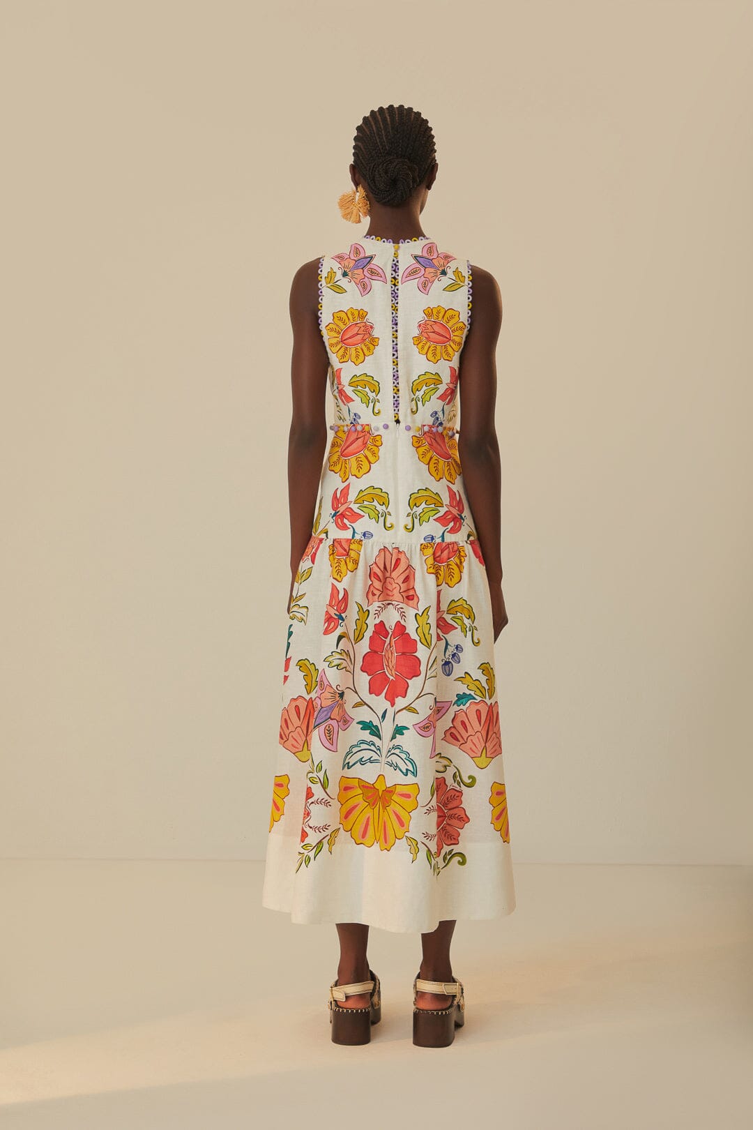 FARM Rio model wearing the Floral Insects Off-White V Neckline Sleeveless Maxi Dress