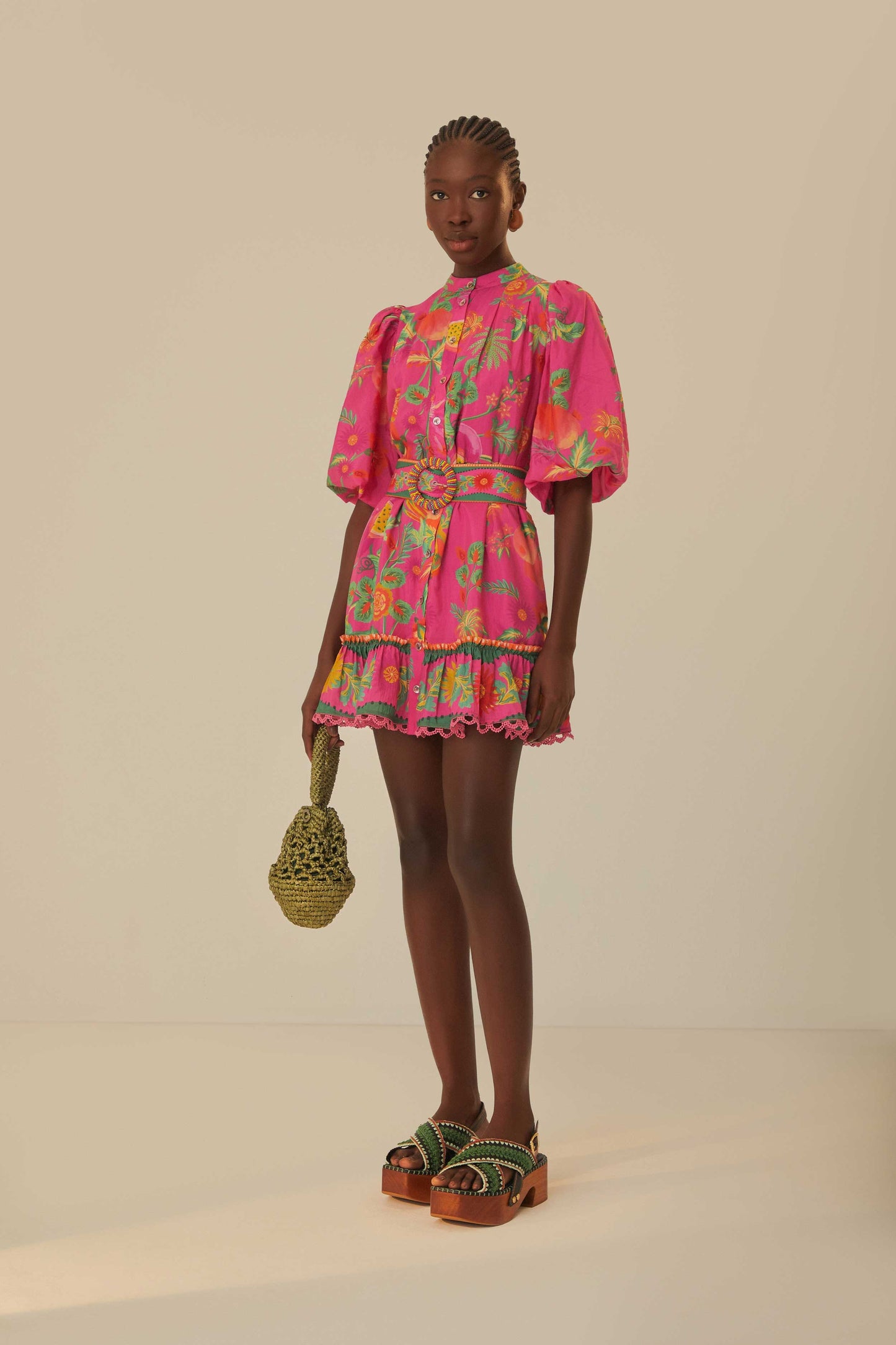 FARM Rio model wearing the Delicate Fruit Garden Pink Mini Dress