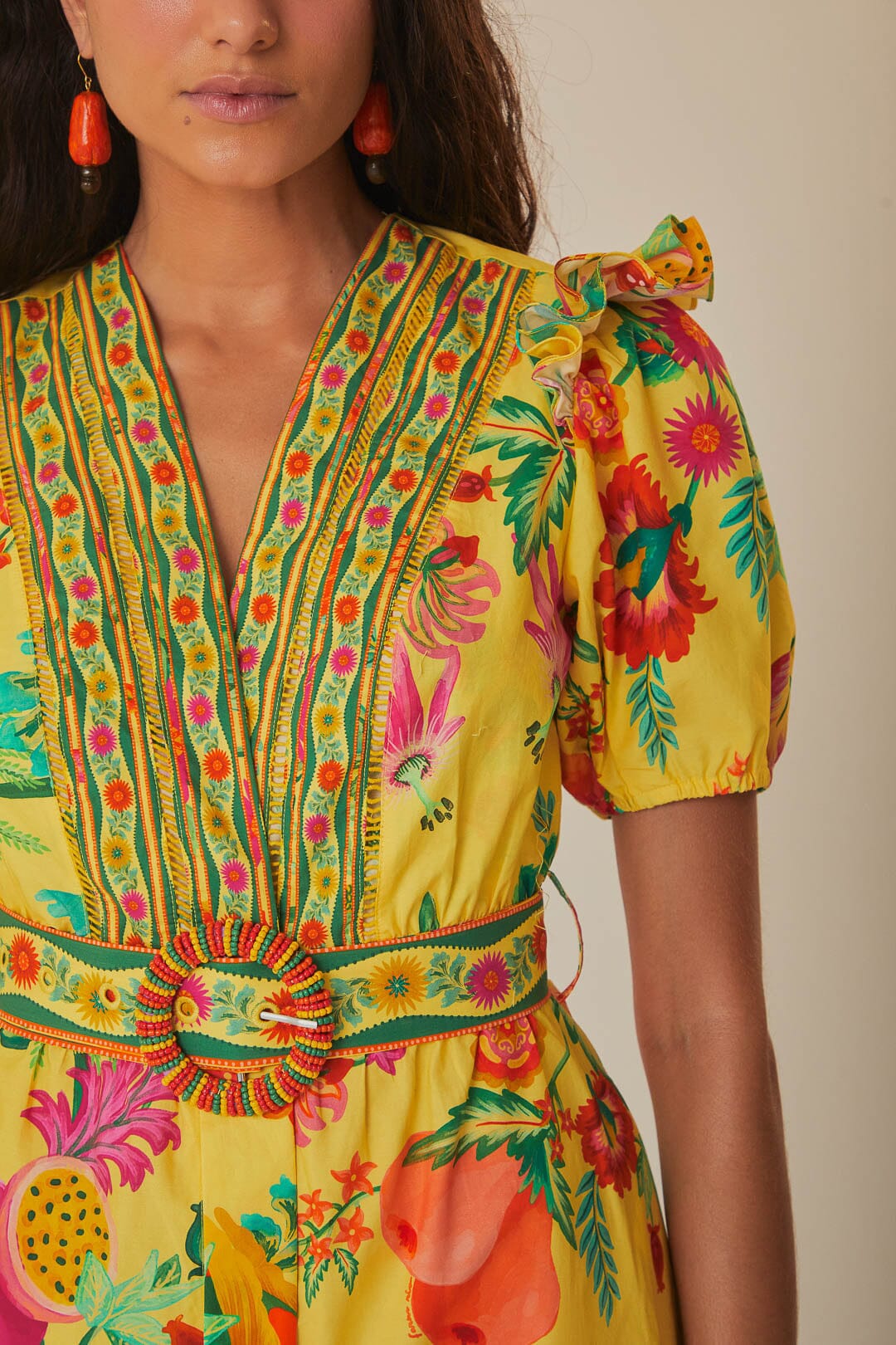 FARM Rio model wearing the Delicate Fruit Garden Yellow Mini Dress
