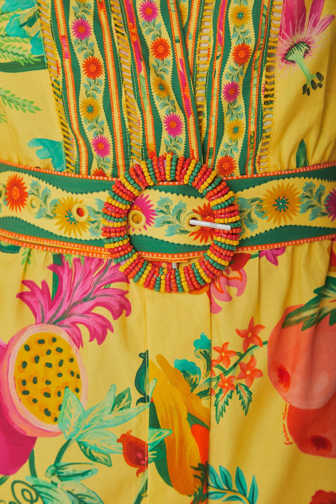 FARM Rio model wearing the Delicate Fruit Garden Yellow Mini Dress