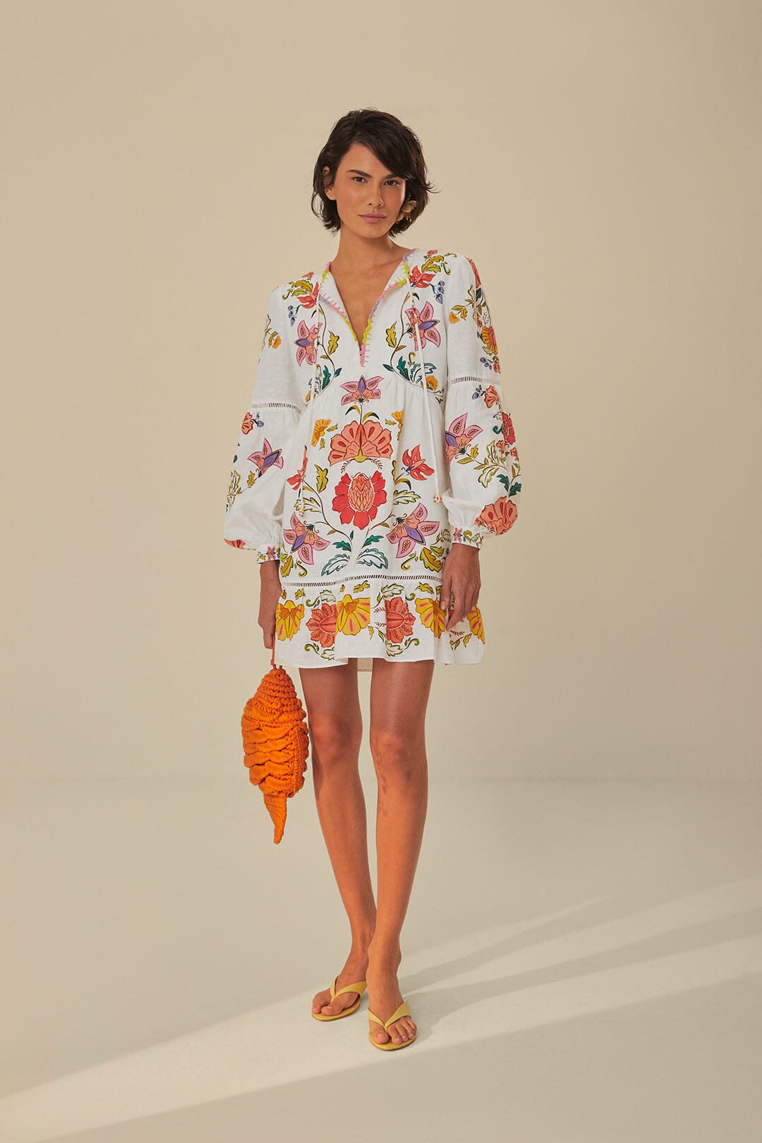 FARM Rio model wearing the Floral Insects Off White Mini Dress