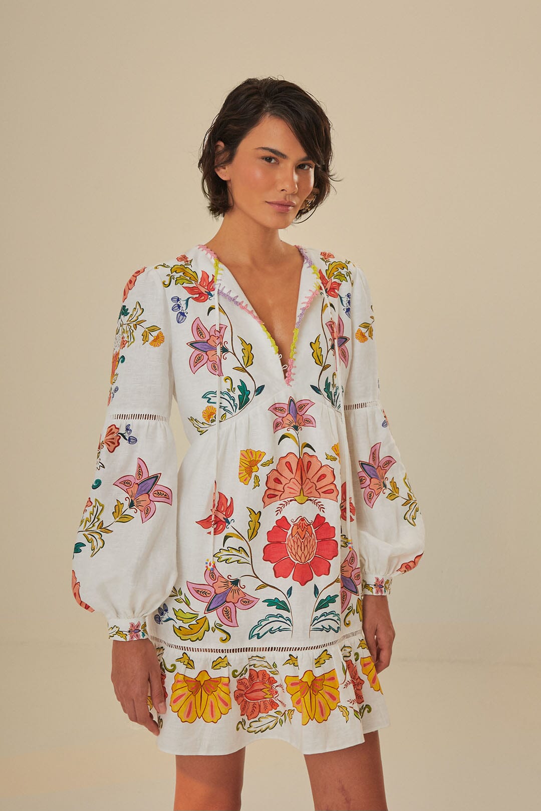 FARM Rio model wearing the Floral Insects Off White Mini Dress