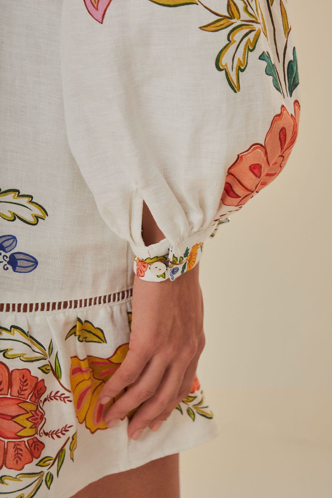 FARM Rio model wearing the Floral Insects Off White Mini Dress