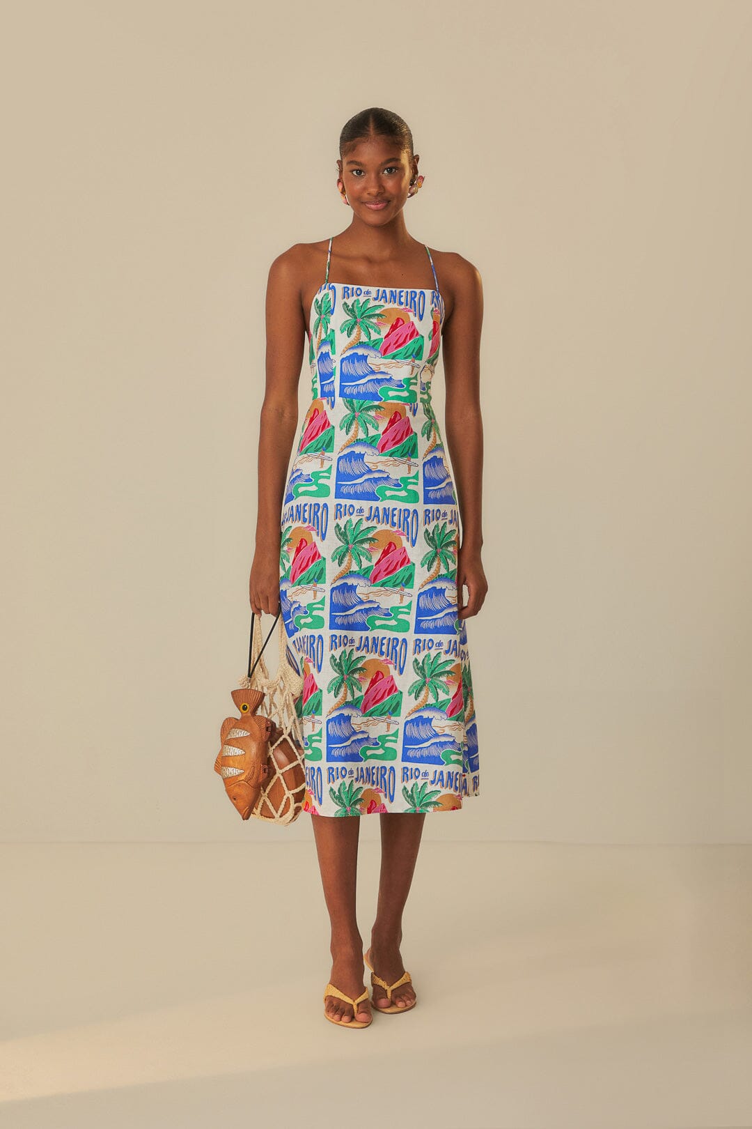 FARM Rio model wearing the Carioca Posters Off-White Midi Dress
