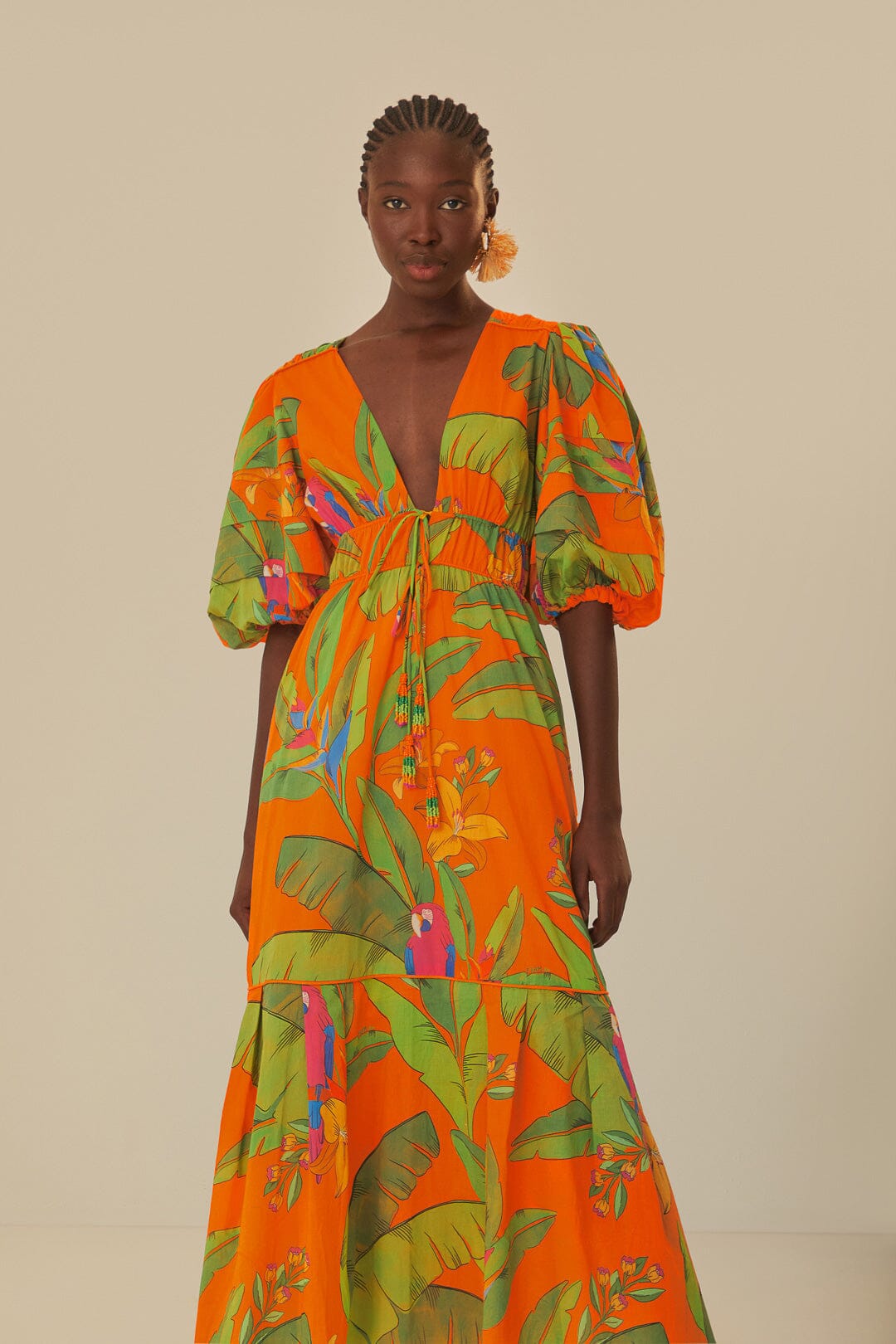 FARM Rio model wearing the Fresh Macaws Orange Midi Dress