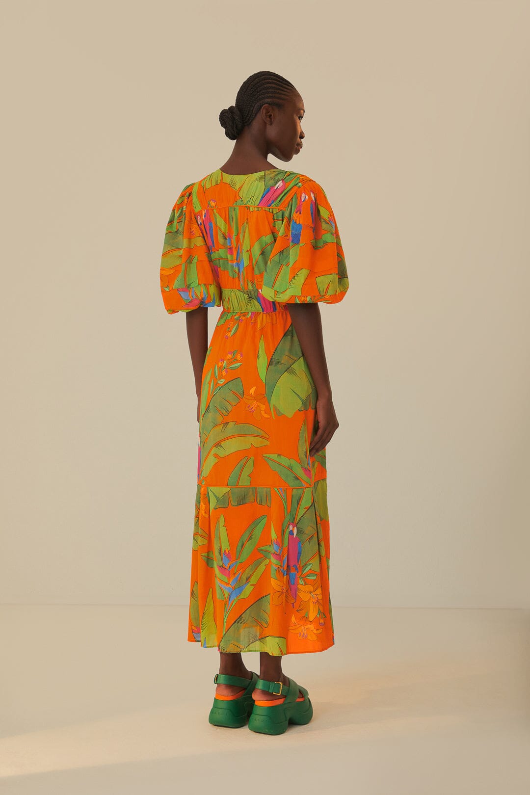 FARM Rio model wearing the Fresh Macaws Orange Midi Dress