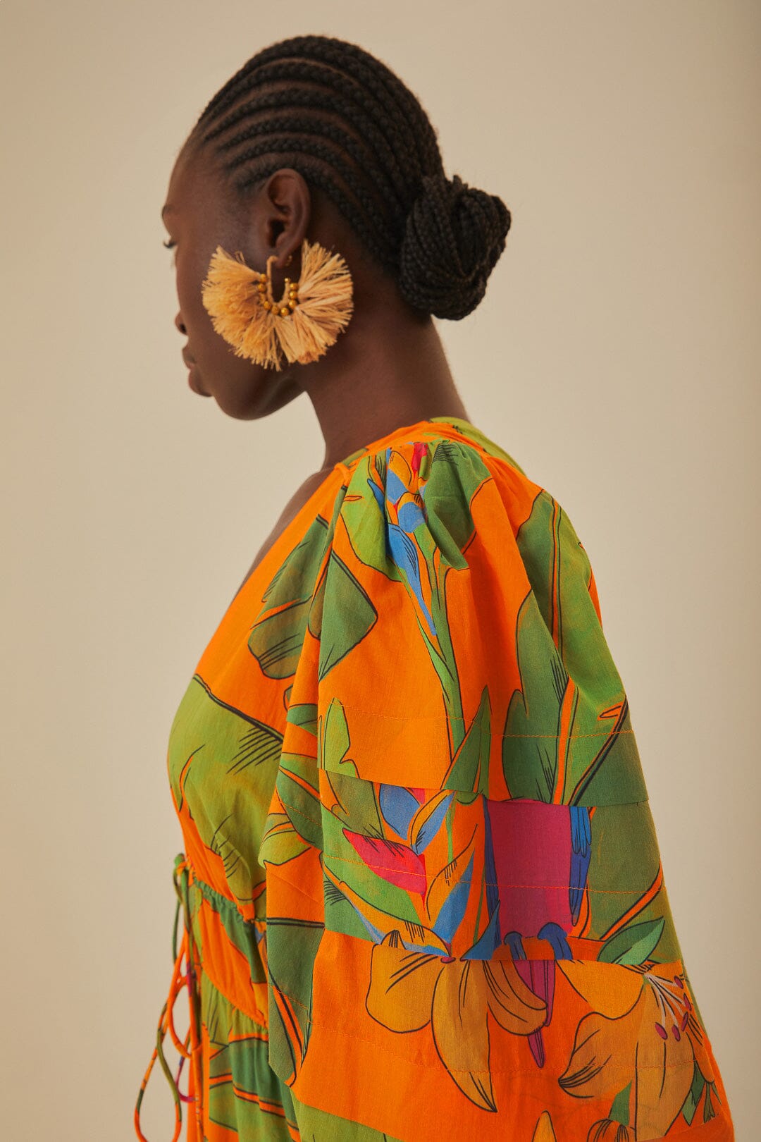 FARM Rio model wearing the Fresh Macaws Orange Midi Dress