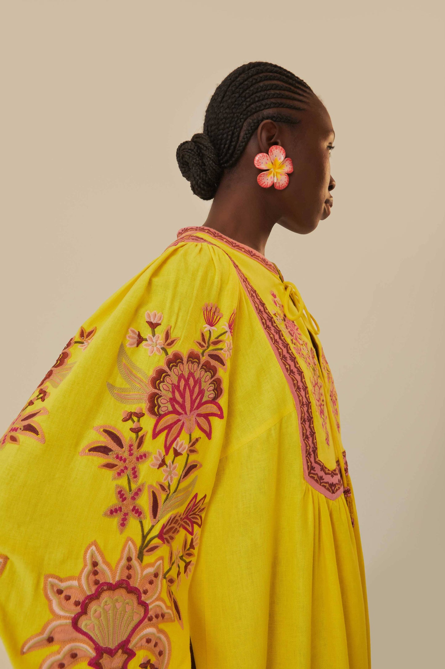 FARM Rio model wearing the Yellow Embroidered Garden Tapestry Midi Dress