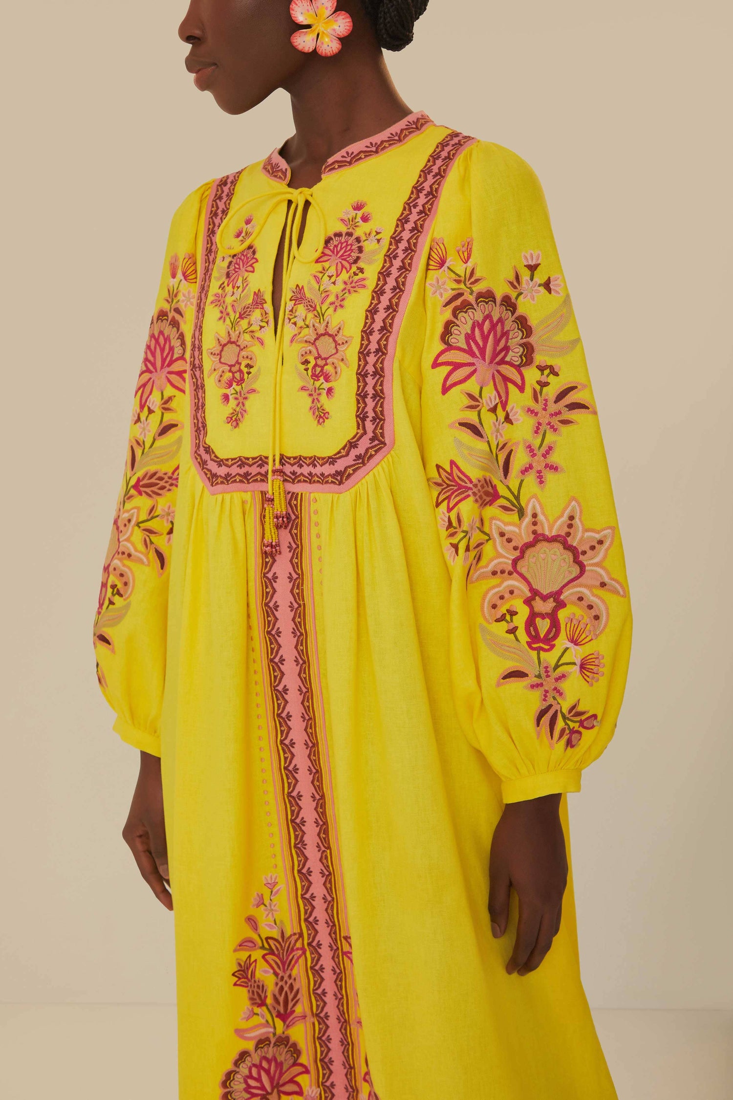 FARM Rio model wearing the Yellow Embroidered Garden Tapestry Midi Dress
